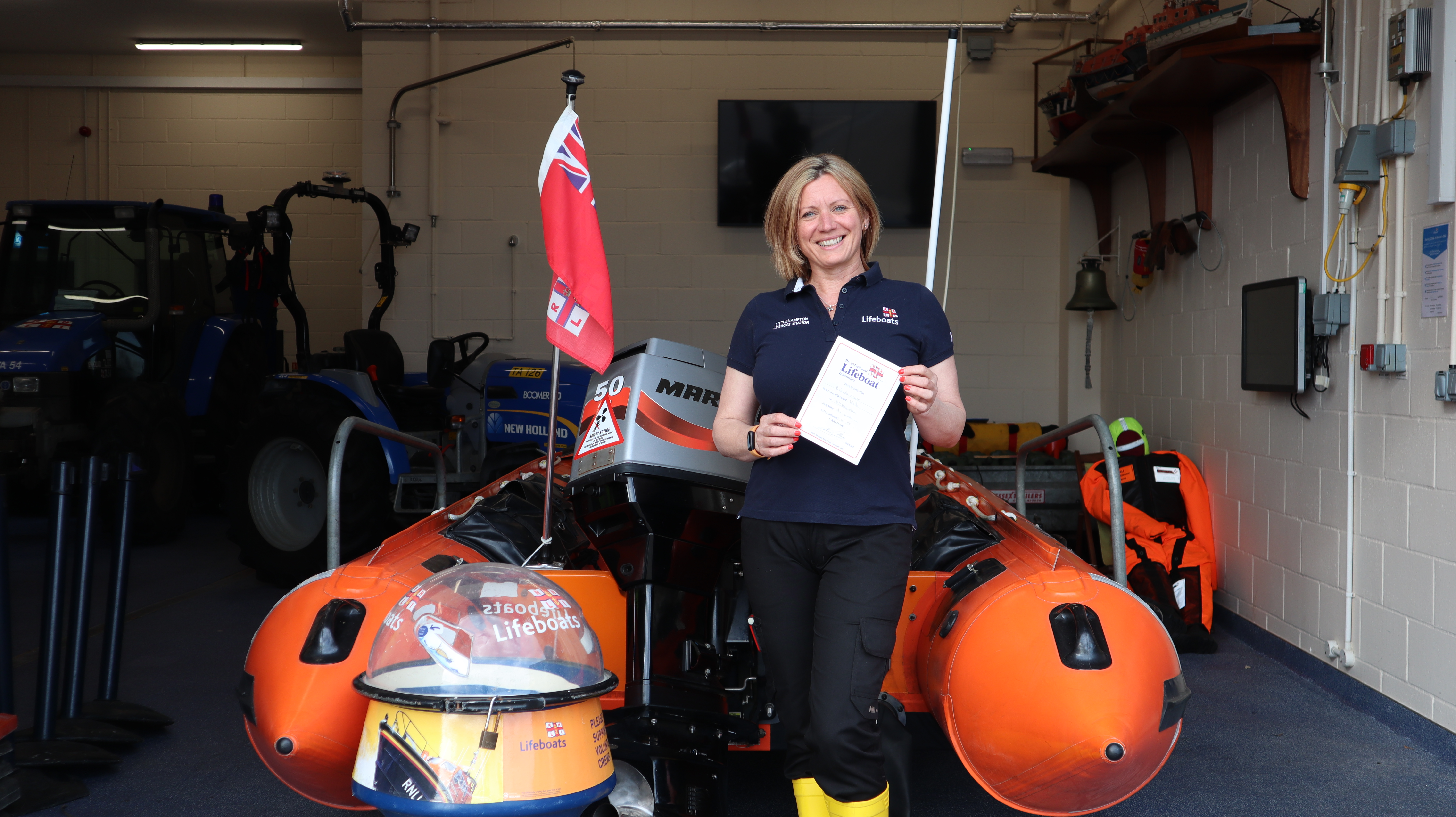 Bea Homer with her original RNLI fundraising certificate from the 1980s
