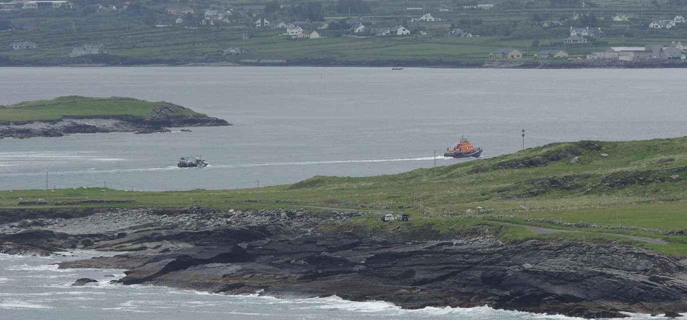 Valentia RNLI towing fishing vessel into Valentia Marina 