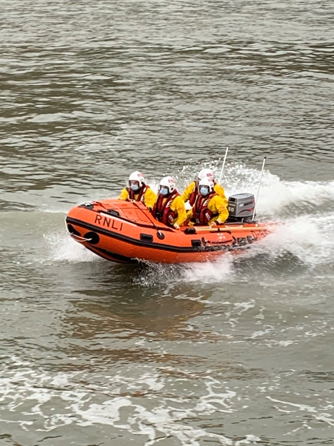 D class lifeboat with crew at sea