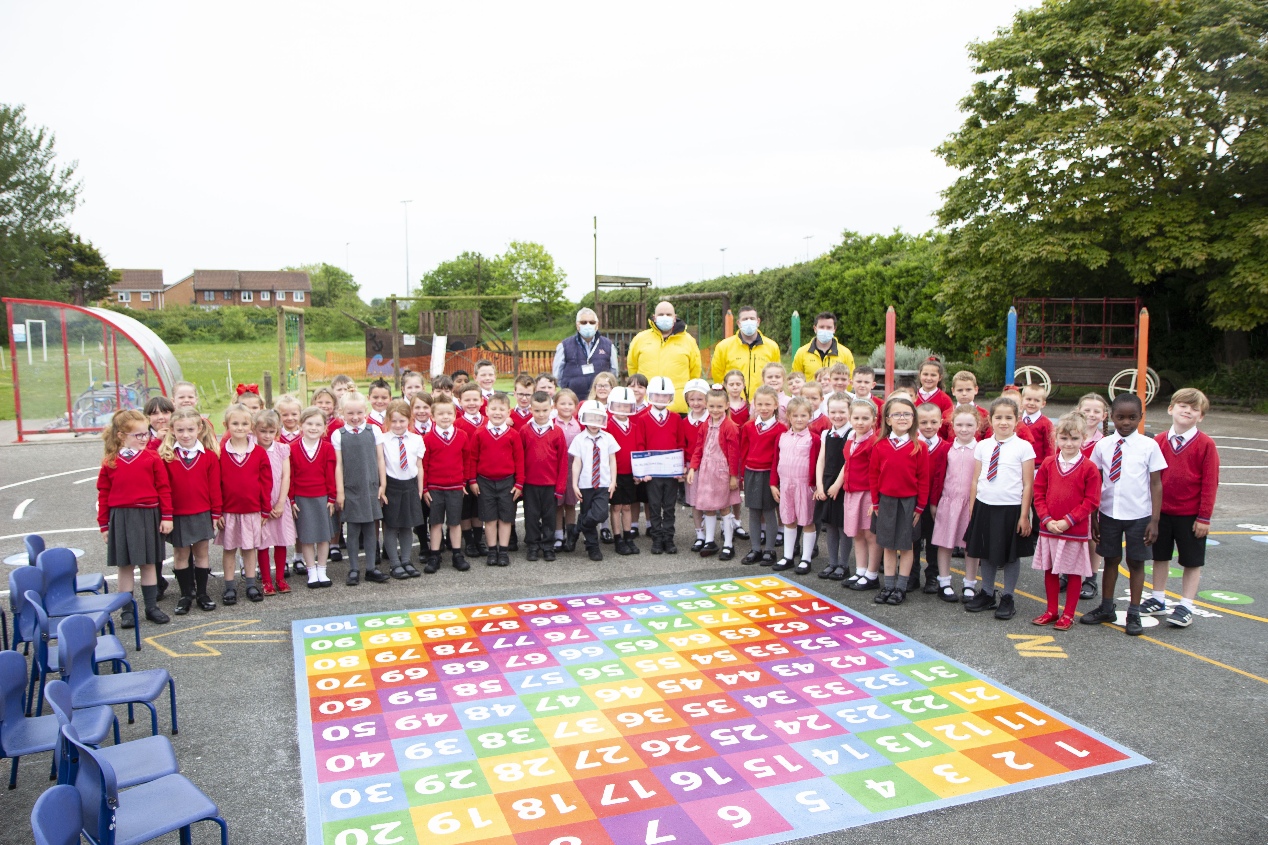 pupils present cheque to Rhyl RNLI