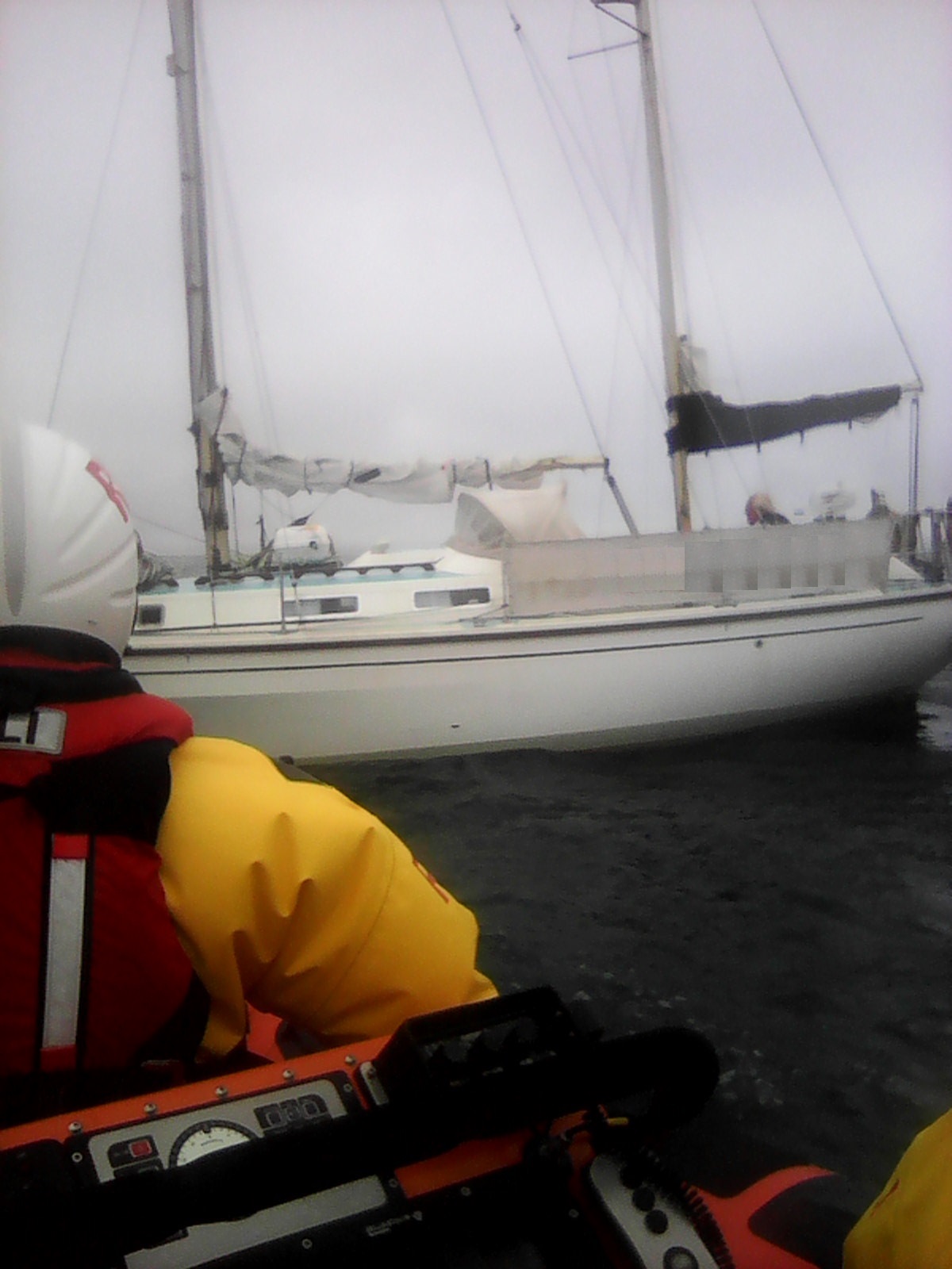 St Bees lifeboat coming alongside the stricken yacht