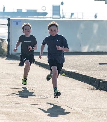Brothers Jack and Orson Wakefield completing their 1000km fundraising run on behalf of the RNLI