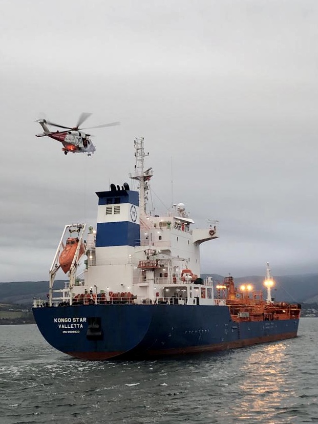 Coastguard helicopter Rescue 199 winching the casualty onboard for transfer to hospital