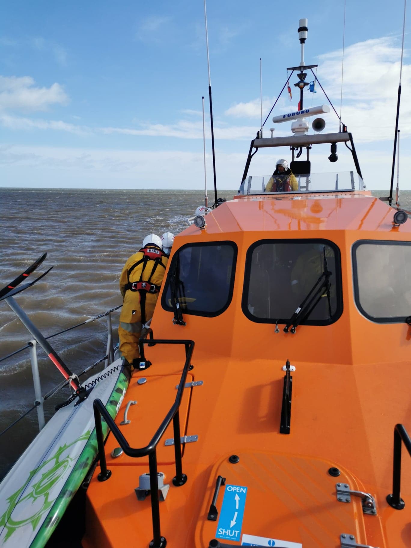 A foil surf board secured to the front of the ALB