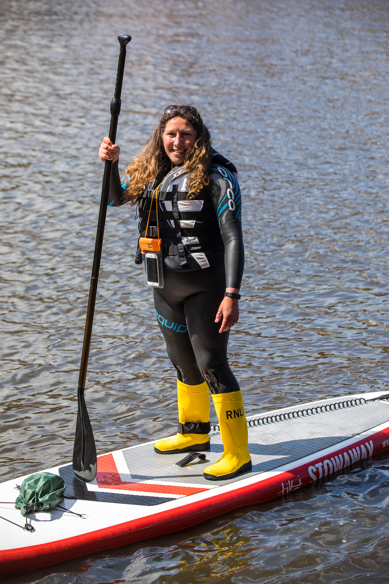 Whitby RNLI crew member Ally Brisby on her paddle board in Whitby harbour.