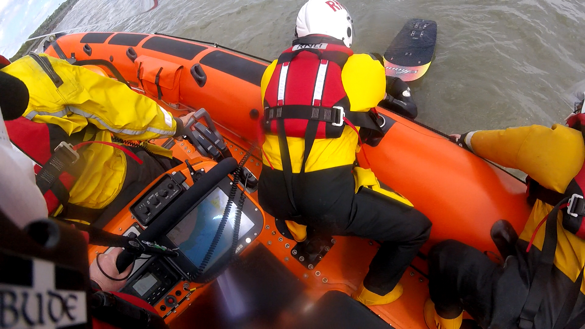 Skerries RNLI helping the casualty to board the lifeboat.