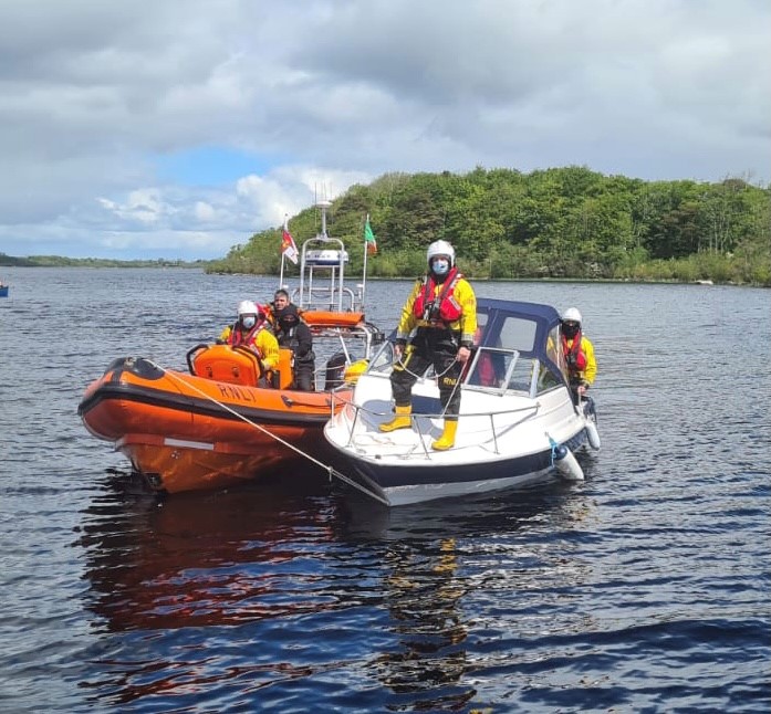 RNLI Lough Ree 'Tara Scougall' with rescued craft at Coosan Point, Athlone, Republic of Ireland
