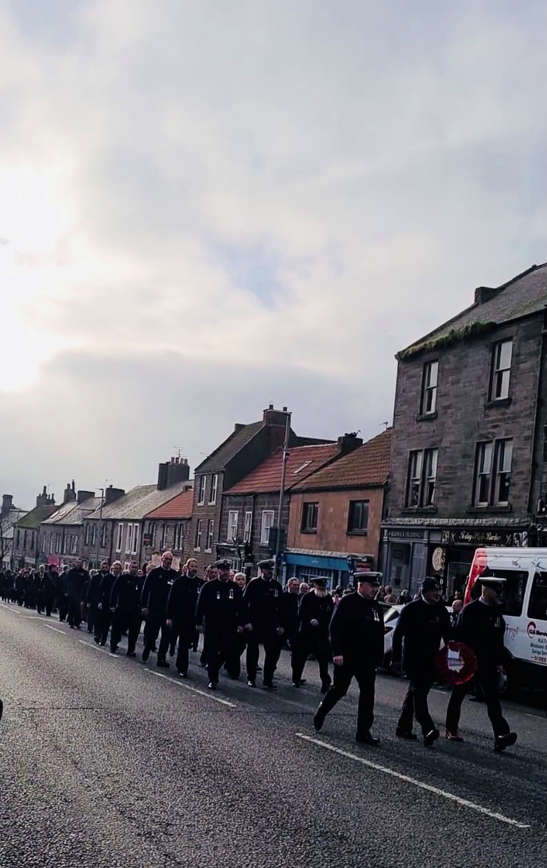 Crew marching up to war memorial