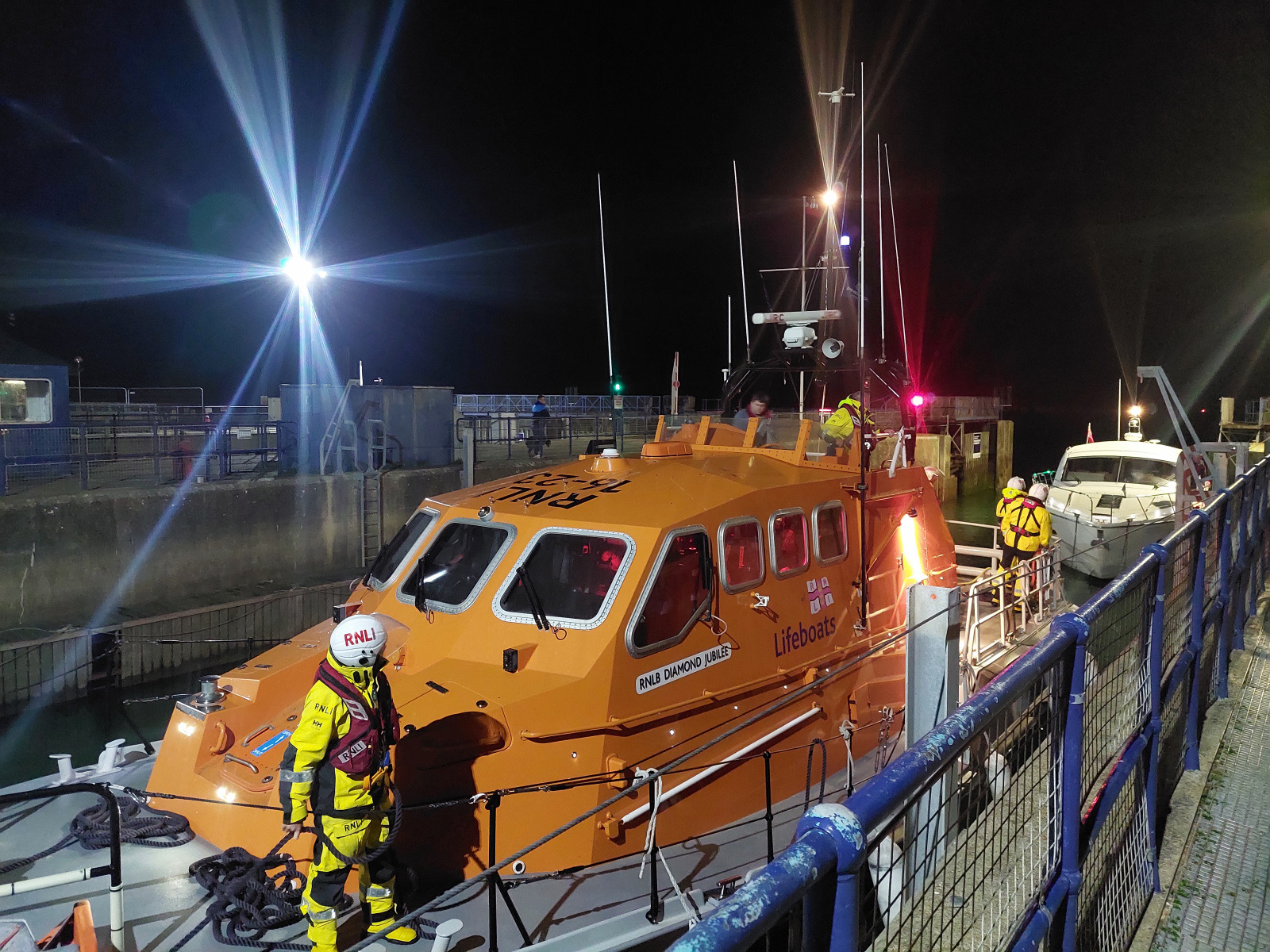 Image showing the RNLI lifeboat and casualty vessel in the locks.