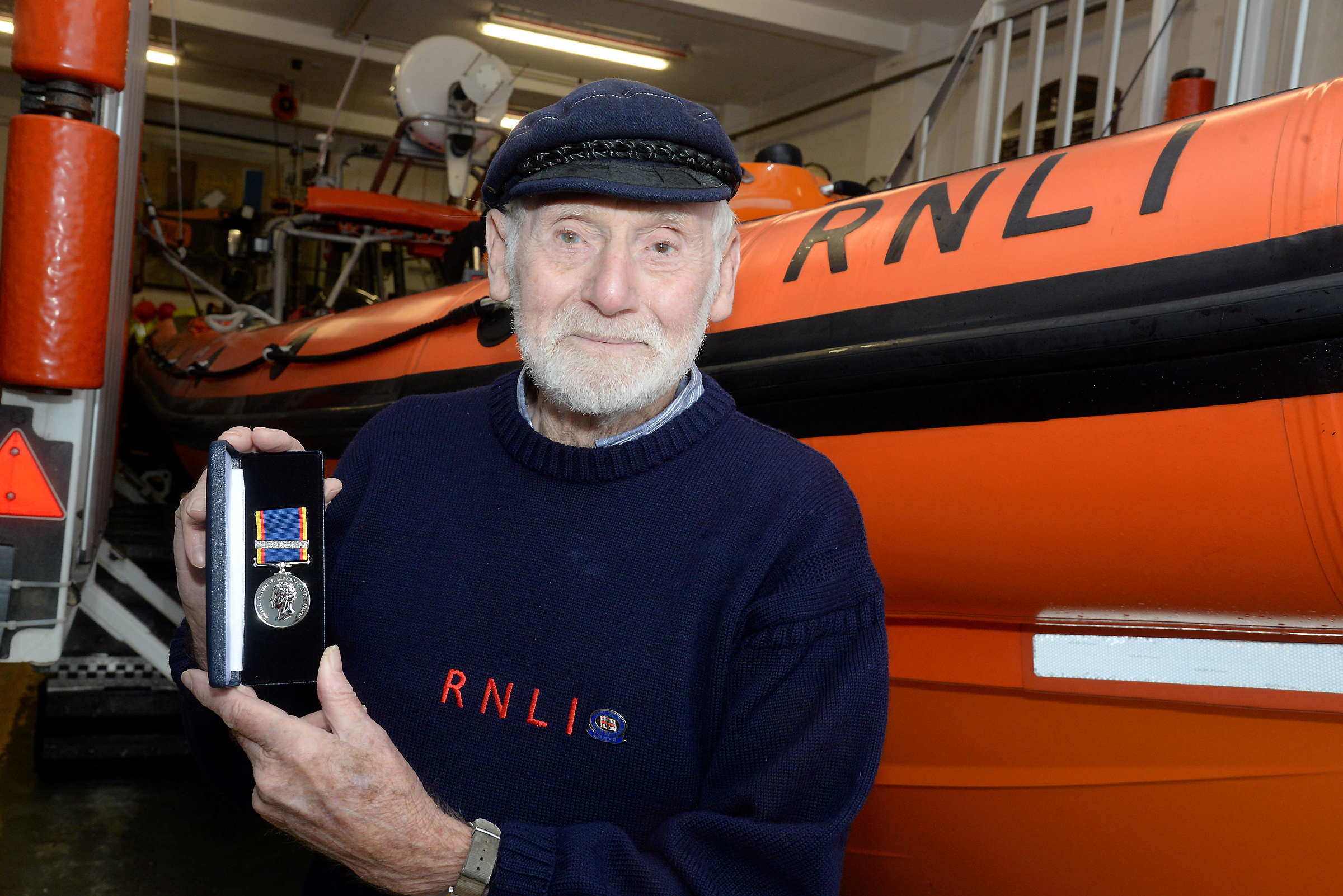 David 'Larry' Lamberton with his 50-year service medal. Picture:Chris Davey
