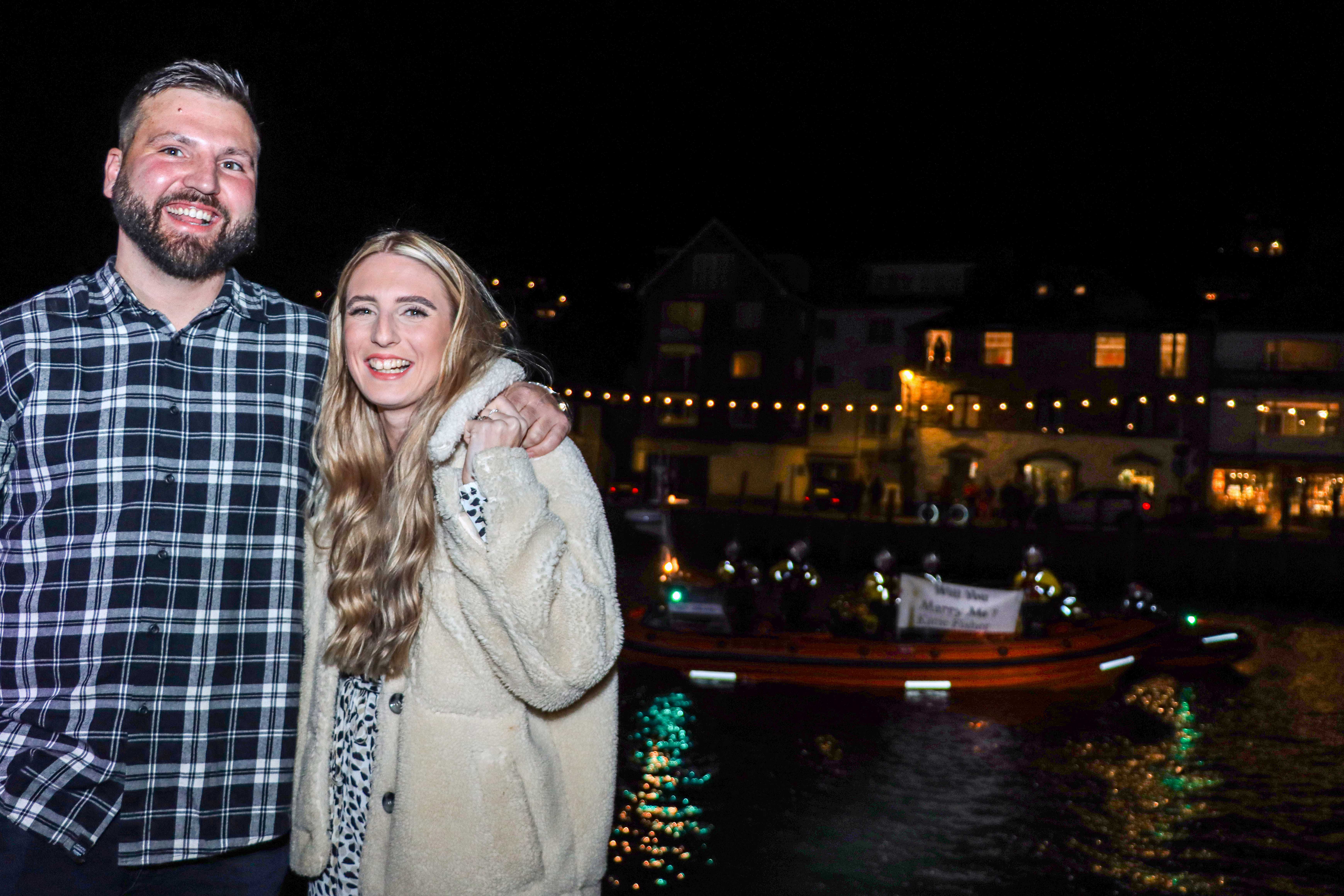 Looe RNLI volunteer Aaron Rix and his fiancée Katie Fisher with Looe RNLI Atlantic 85 in the background (1)
