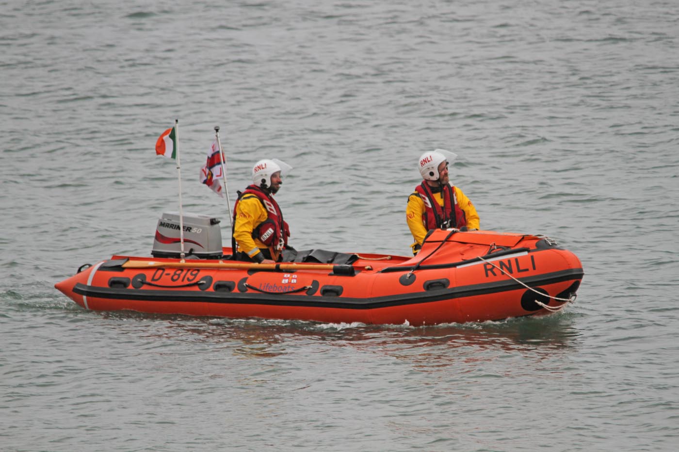 Two volunteers in a D-Class lifeboat