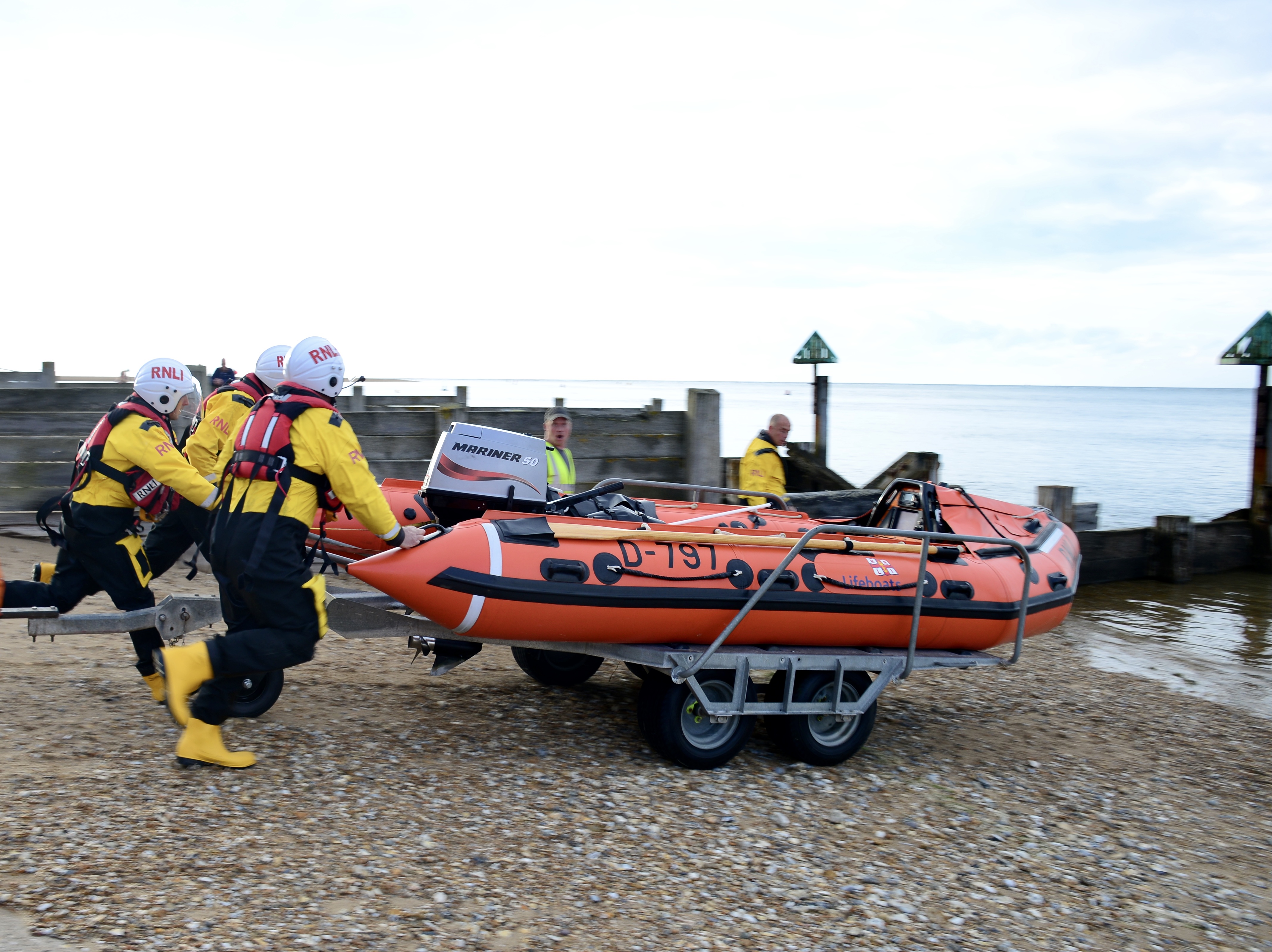 Wells inshore lifeboat crew launching the lifeboat