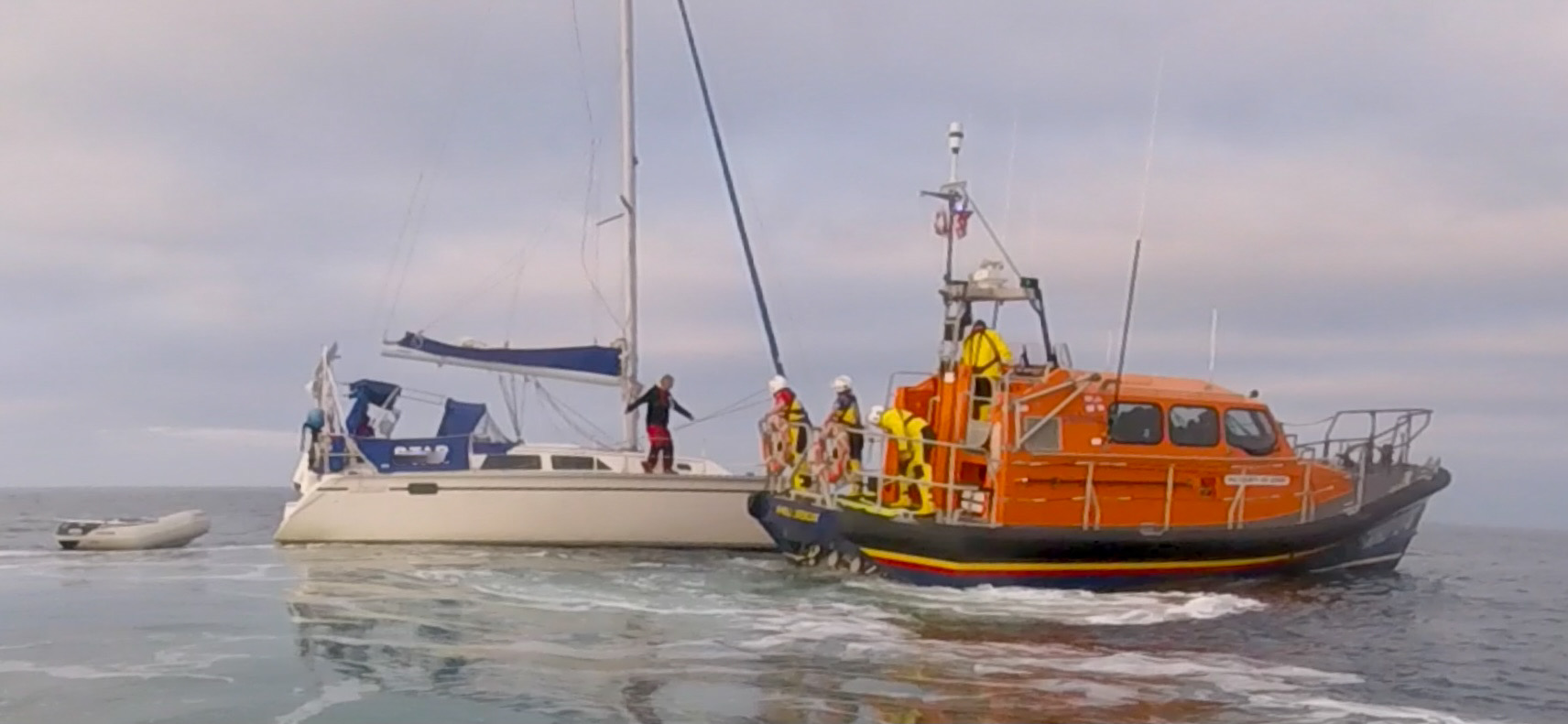 Amble lifeboat towing the casualty vessel south 
