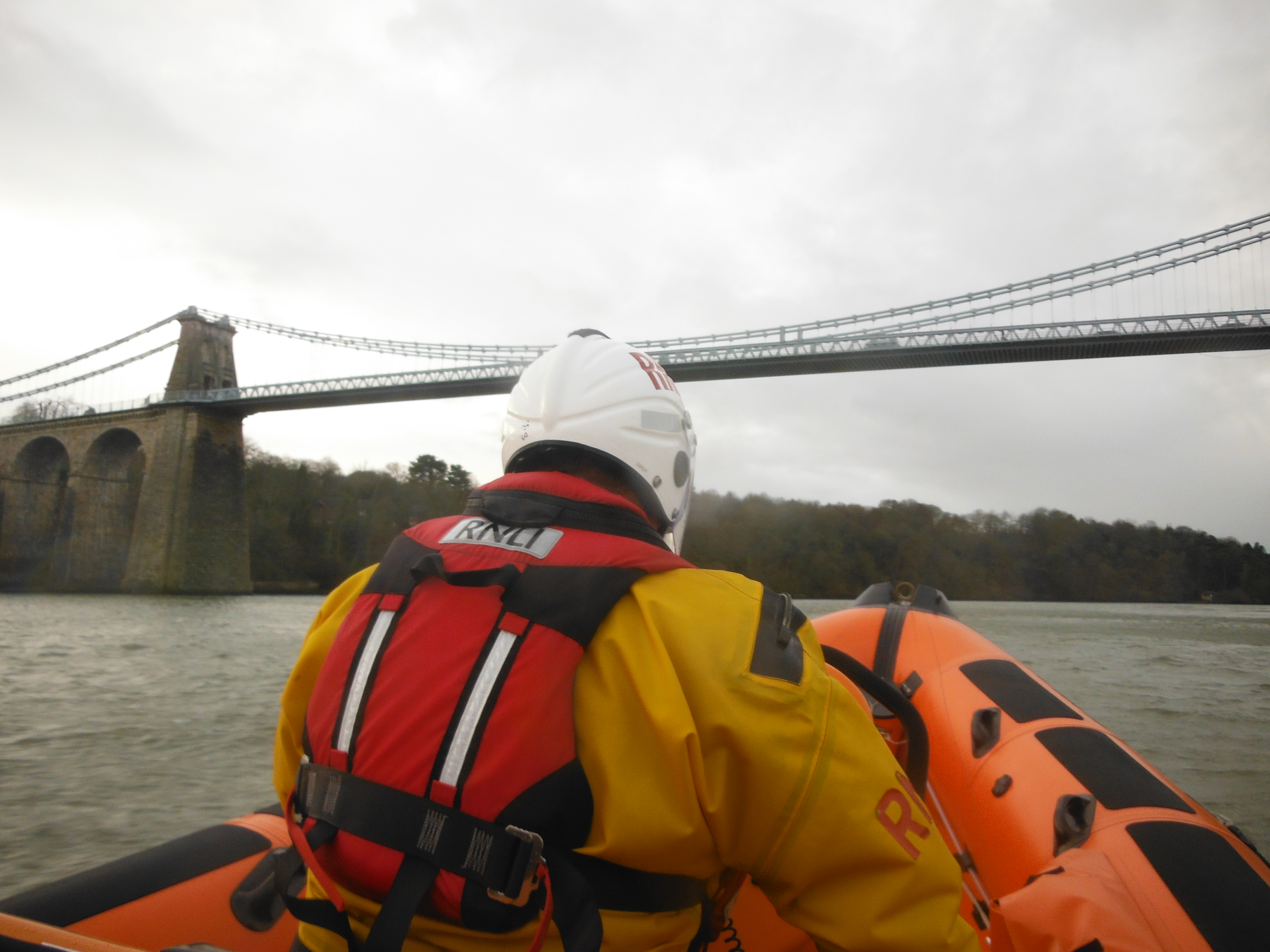 Beaumaris Lifeboat approaching the Menai Suspension Bridge
