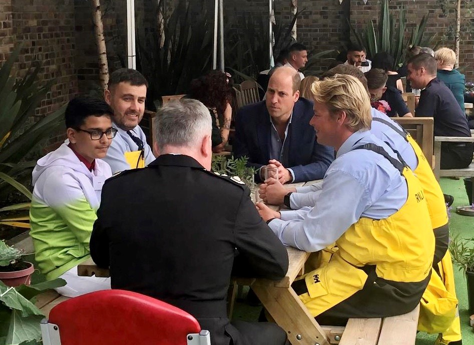 Prince William meets Ravi Saini and Scarborough crew members Adam Sheader (left) Rudi Barman and Rob Gaunt