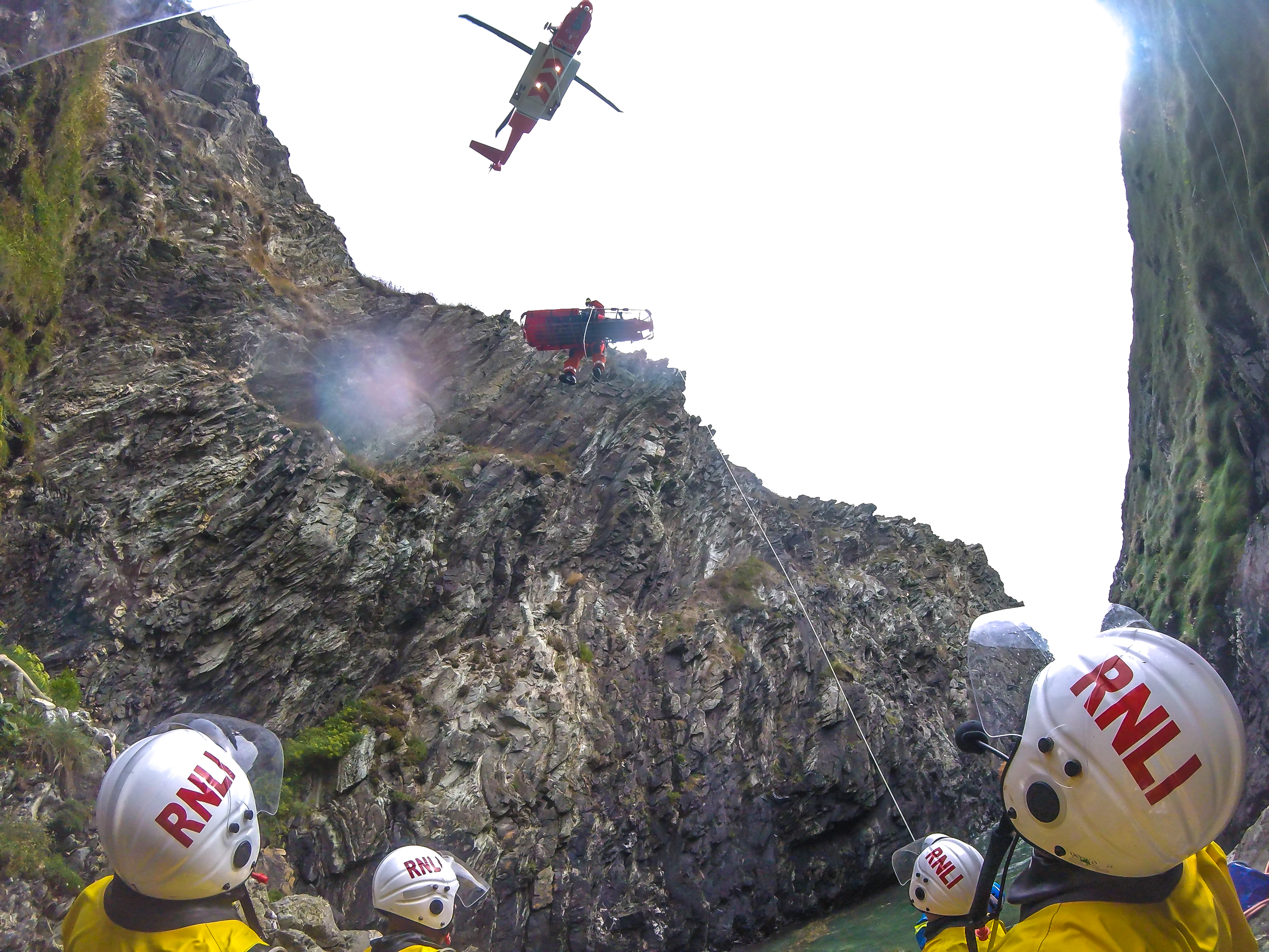 casualty being airlifted by stretcher