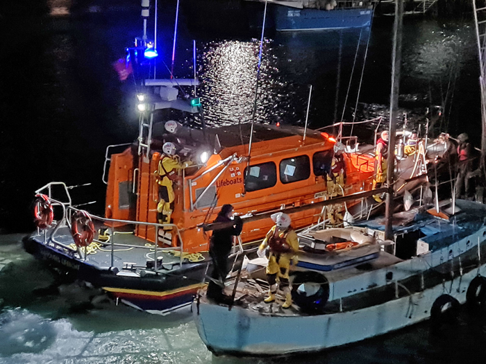 Seahouses Lifeboat and casualty schooner alongside, enter Seahouses Harbour