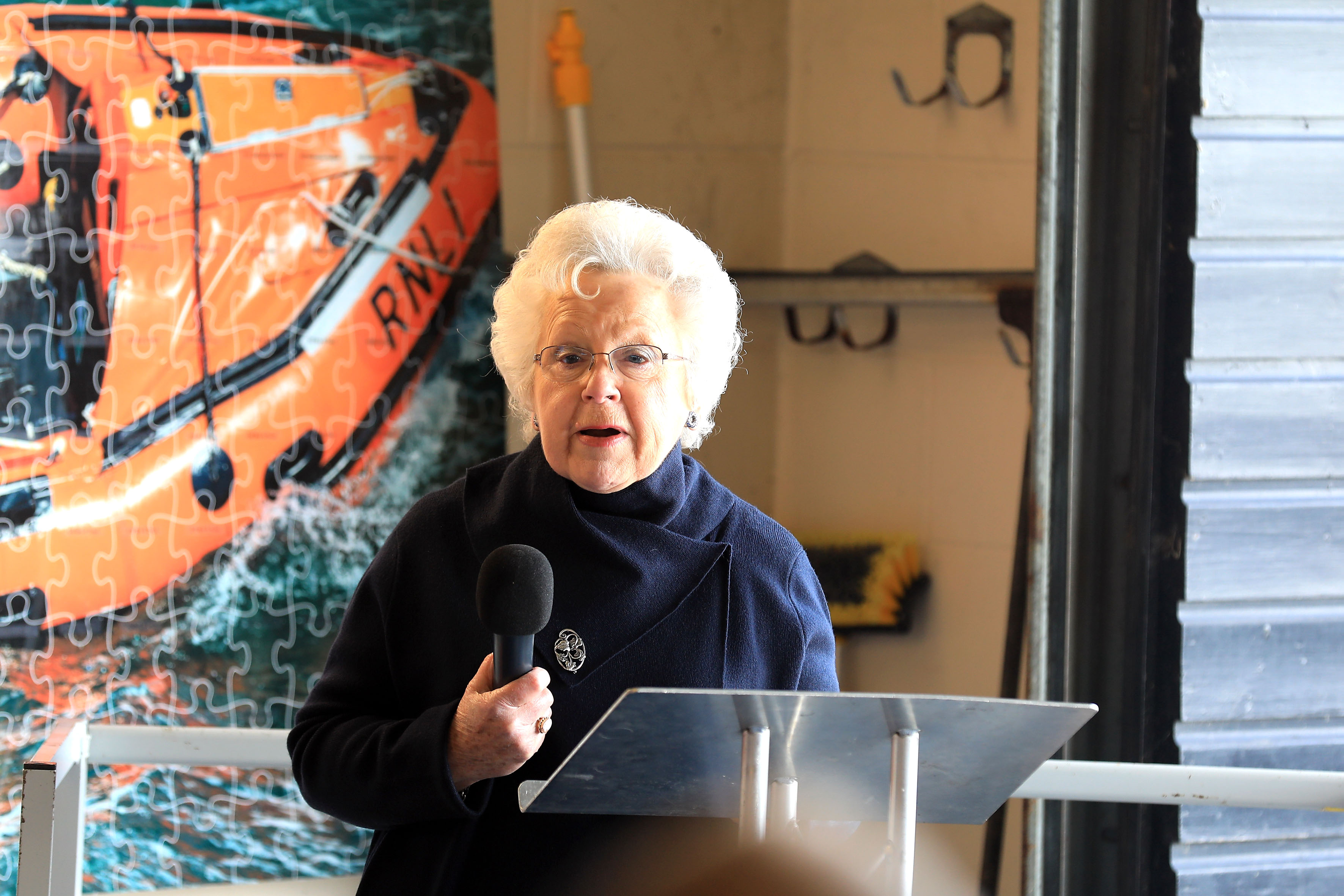Marilyn Bass, previous donor of 'Brian's Pride,' hands the lifeboat into the care of the RNLI.