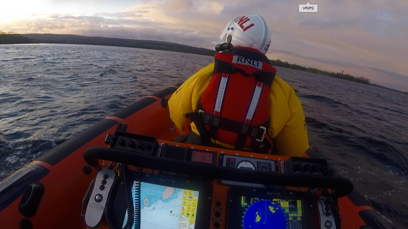 View from behind helm, casualty vessel ahead in the distance over the port bow