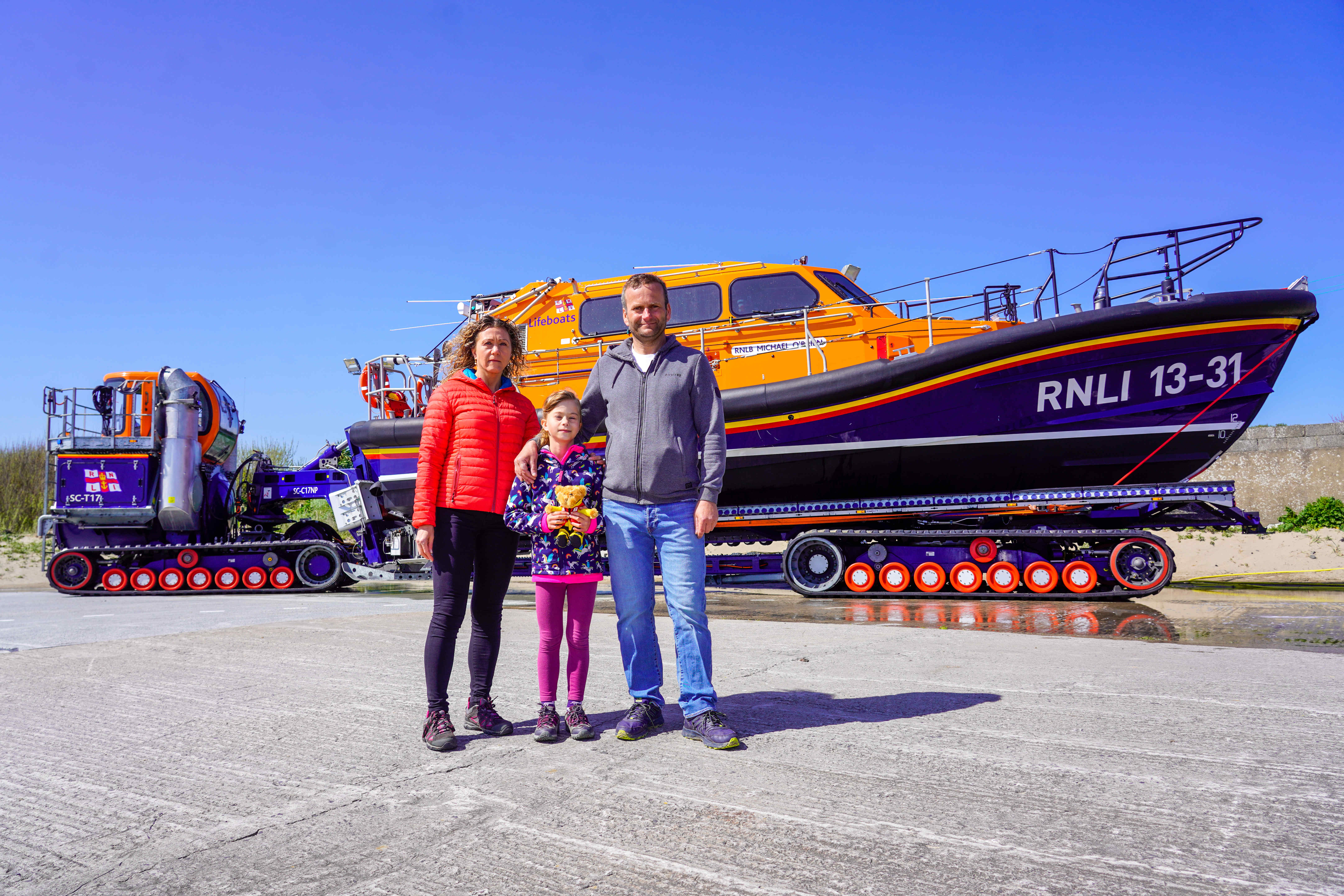 Rescued kayaker Andrzej Kolobius and wife Aneta and daughter Nicola