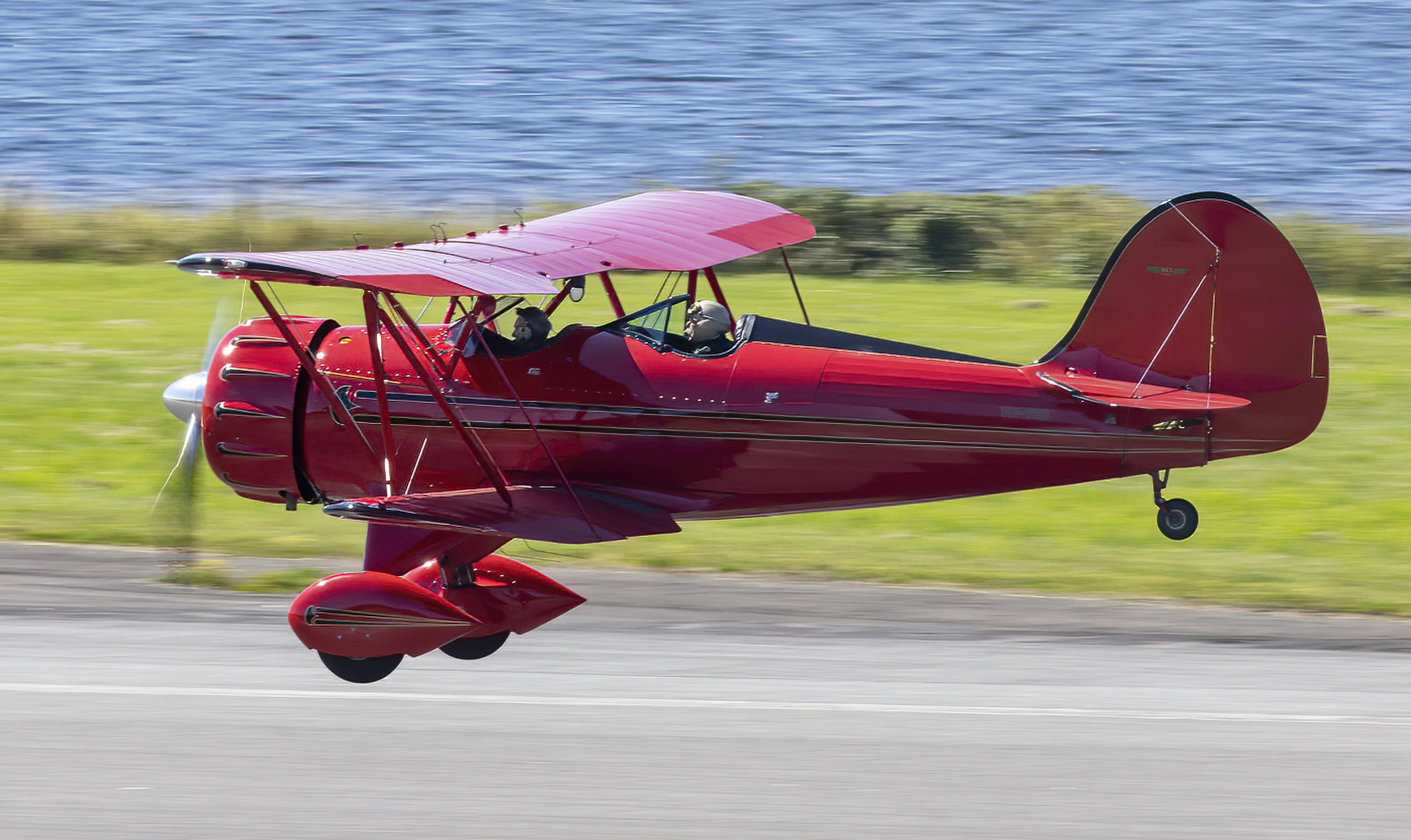 The WACO biplane is flown past Oban airport