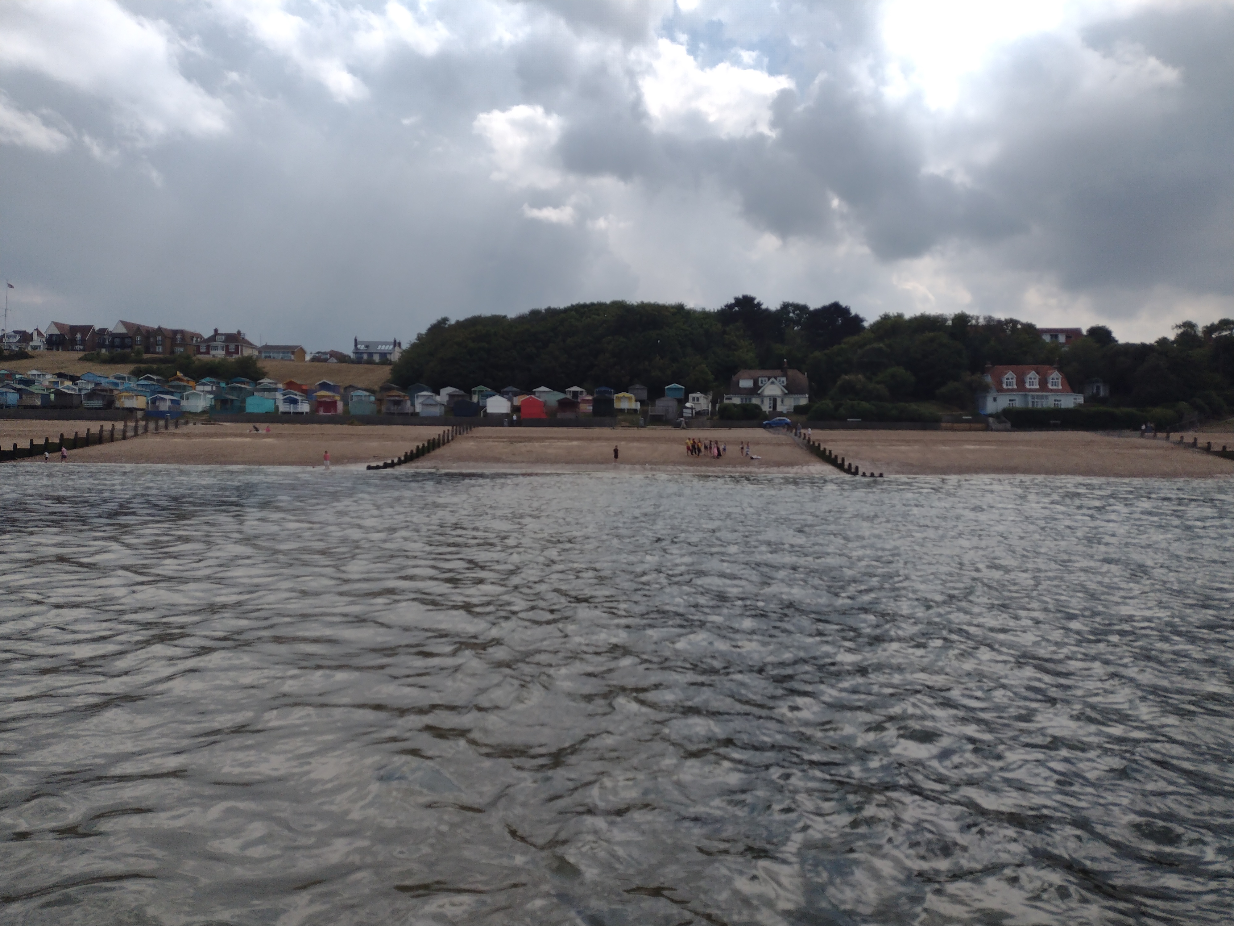 The scene from Whitstabe lifeboat at shingle spit known as the Whitstable Street on Tankerton seafront 4 hours before high tide.
