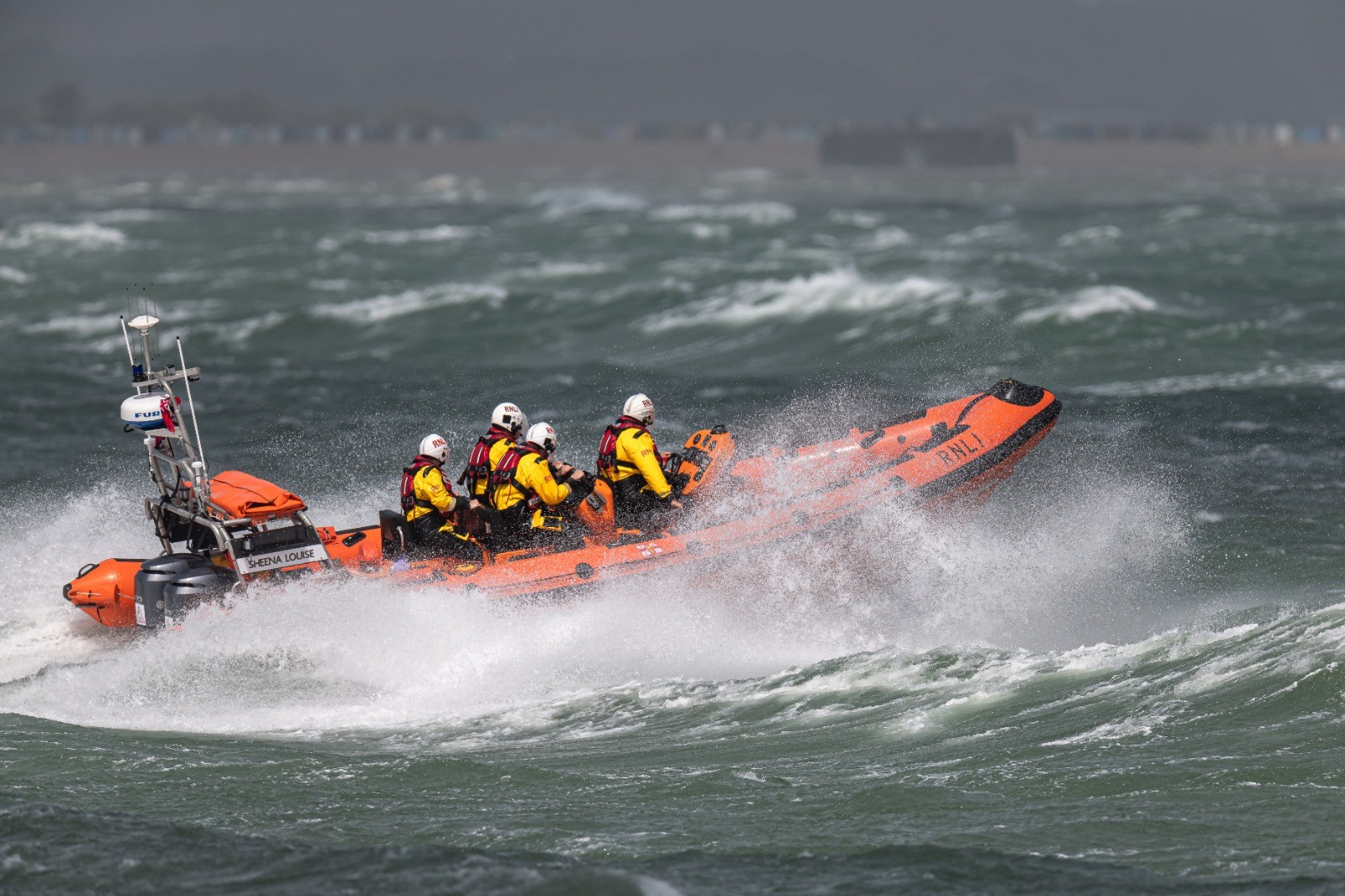 Stock photo of the Cowes Atlantic 85 lifeboat at sea.
