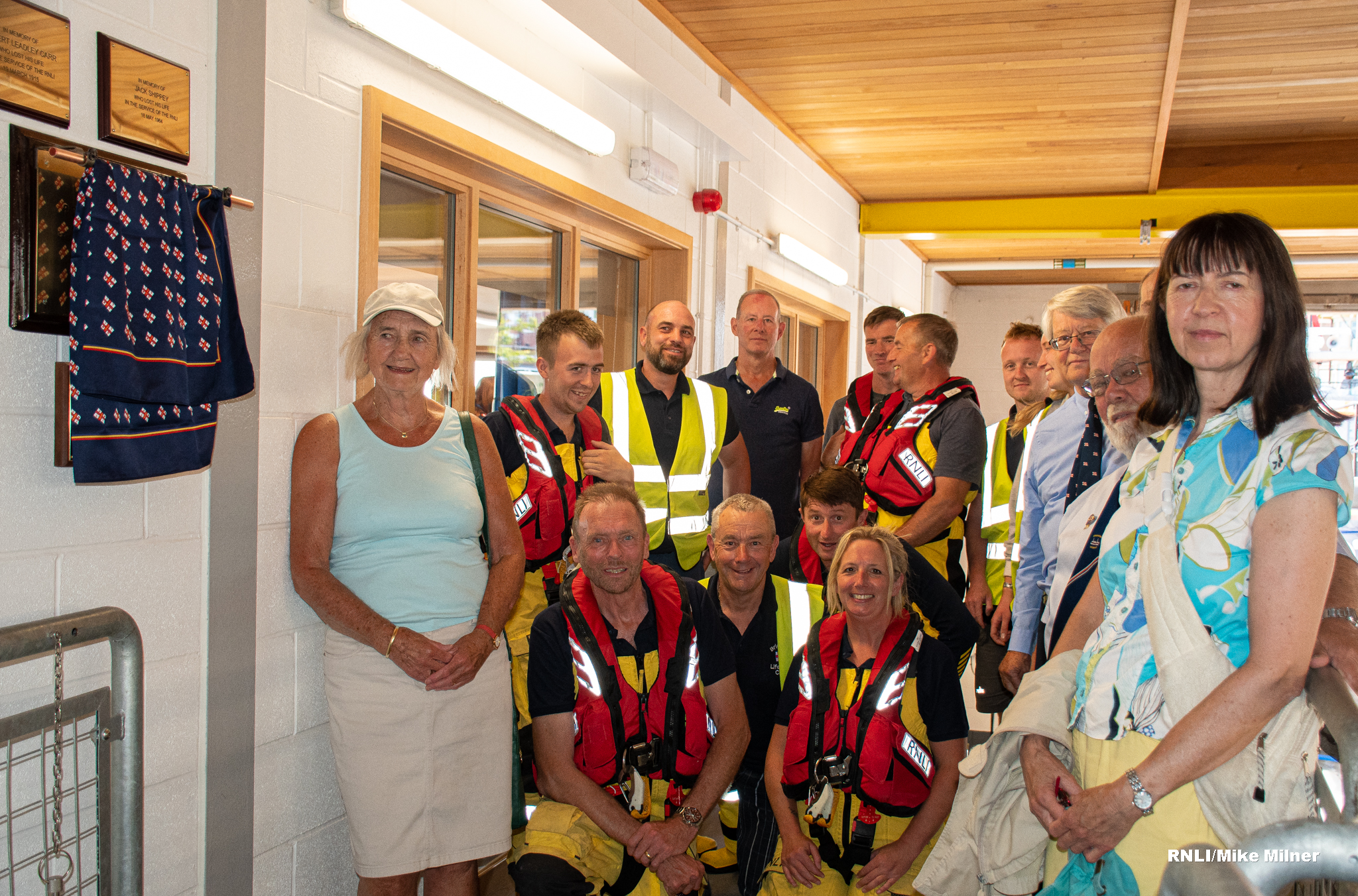 Judith and Diana with volunteer crew at unveiling of plaque at Bridlington Lifeboat Station