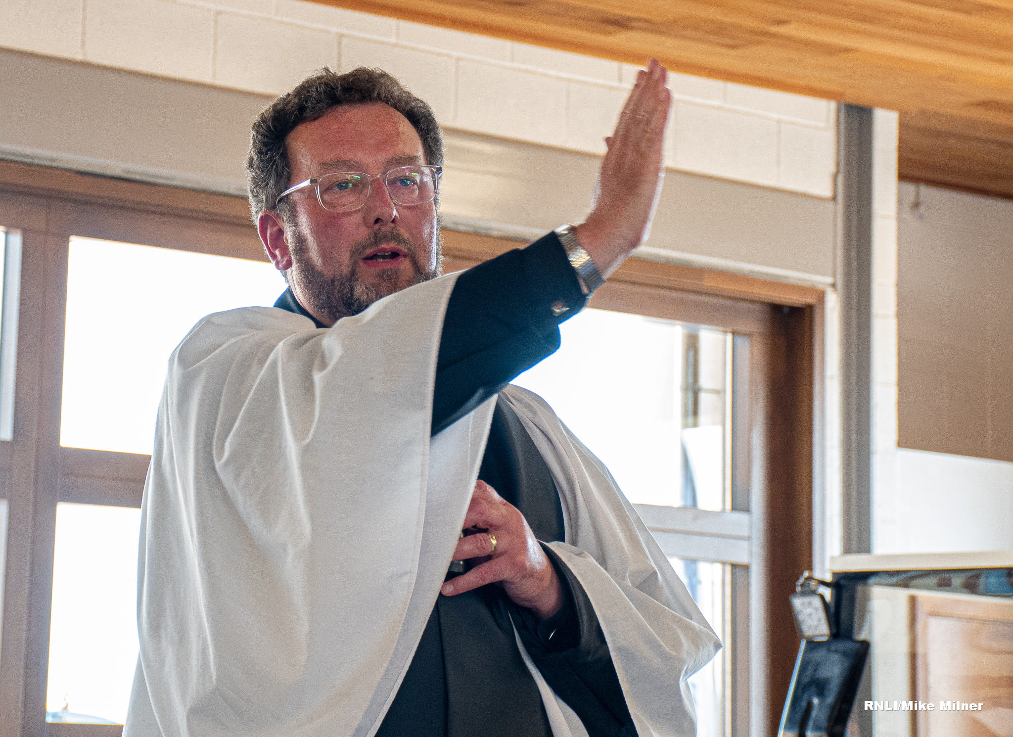 Reverend Matthew Pollard leads the service of Dedication