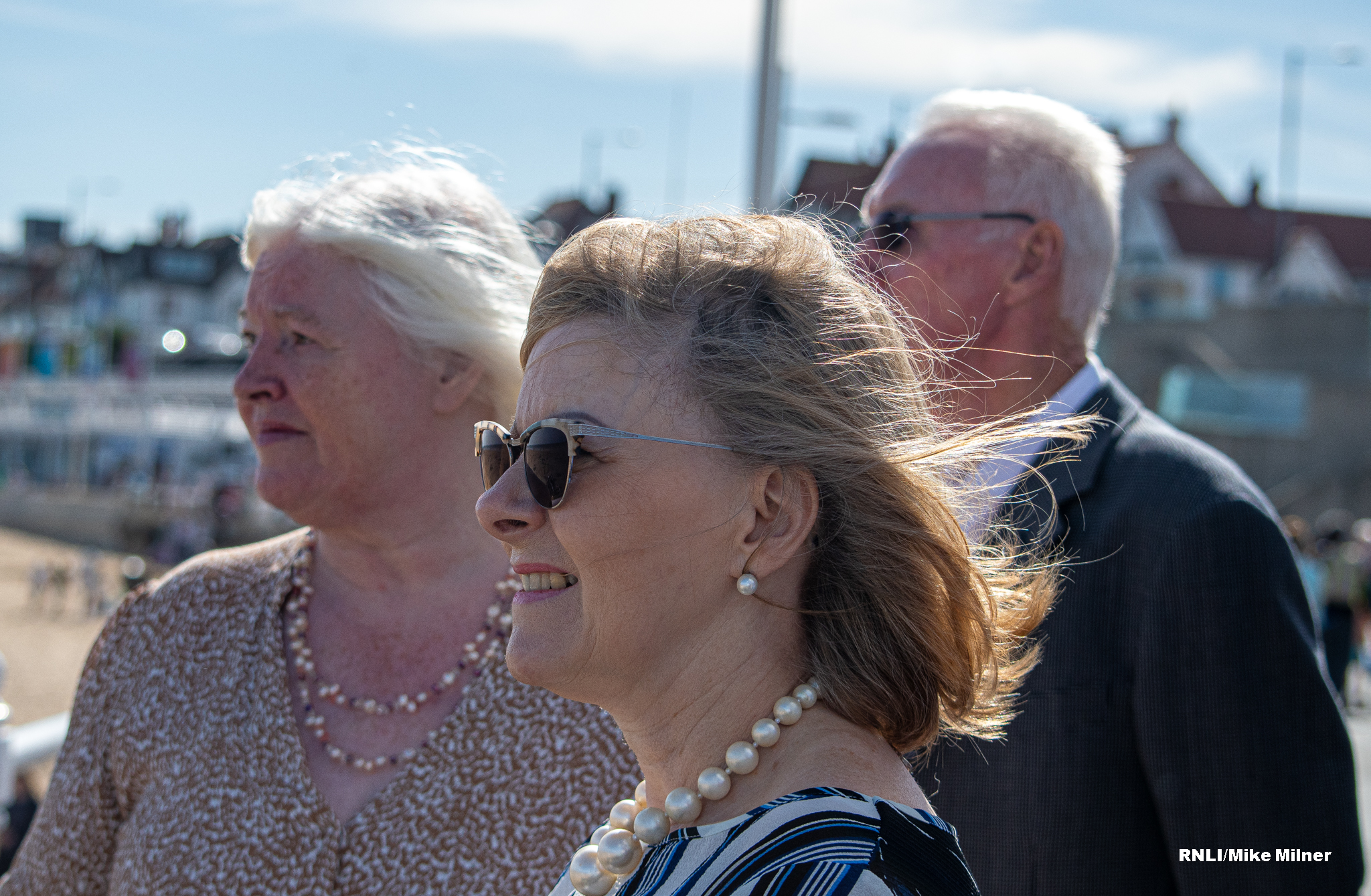 Family of Ernie Wellings watching the boat going through its paces at sea.
