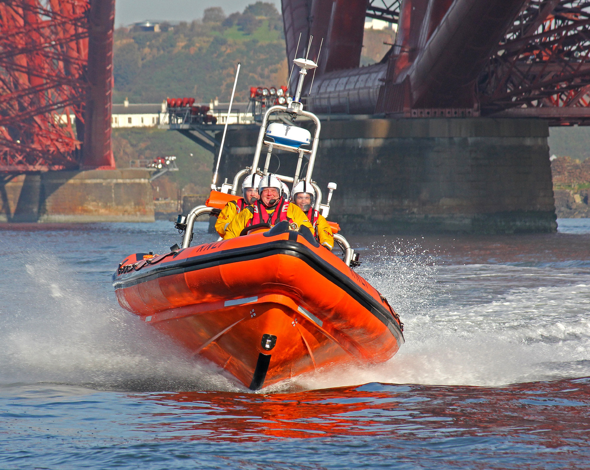 Iain at the helm, with the Forth Rail Bridge in the background