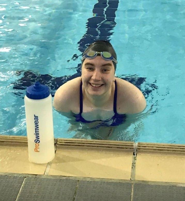 Claire can be seen at the end of her charity swim after swimming 840 lengths in under 5.5 hours