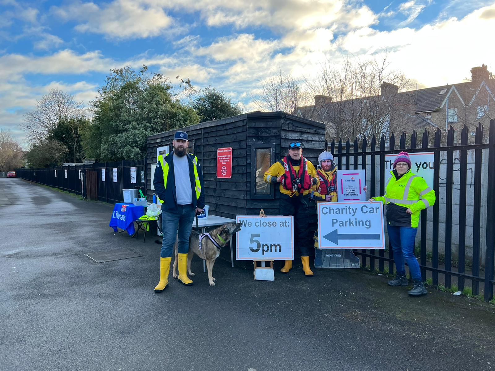 Lifeboat crewmember Richard Monje and his dog Rosie, Helmsman Andy Mayo and Chair of Fundraising Kellie Gray at Whitstable Junior School ready for business on Saturday.