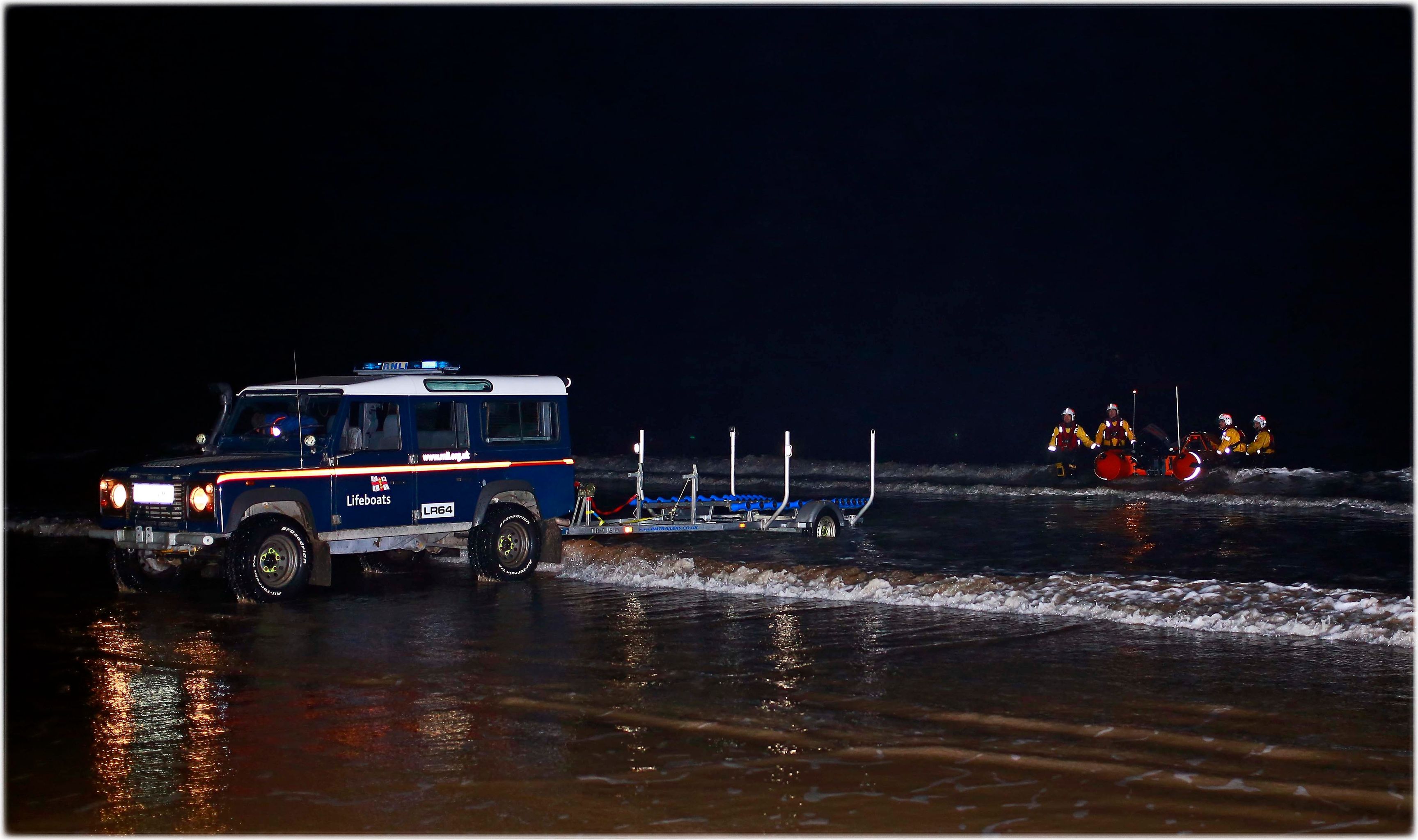 The landrover prepares to recover D861 Hugo Missen at the waters edge following its first launch on traning exercise.