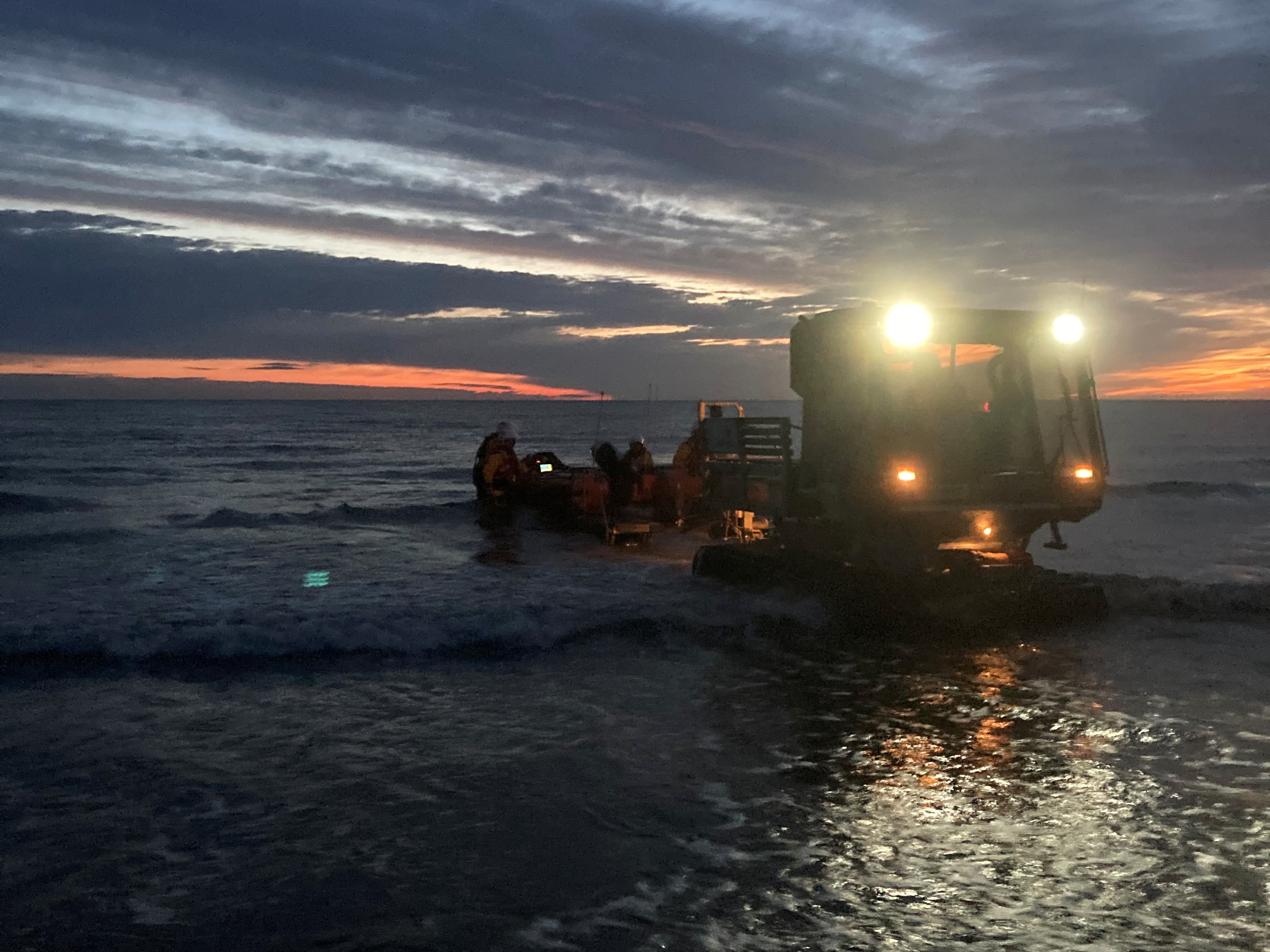 Inshore lifeboat launching in the dark