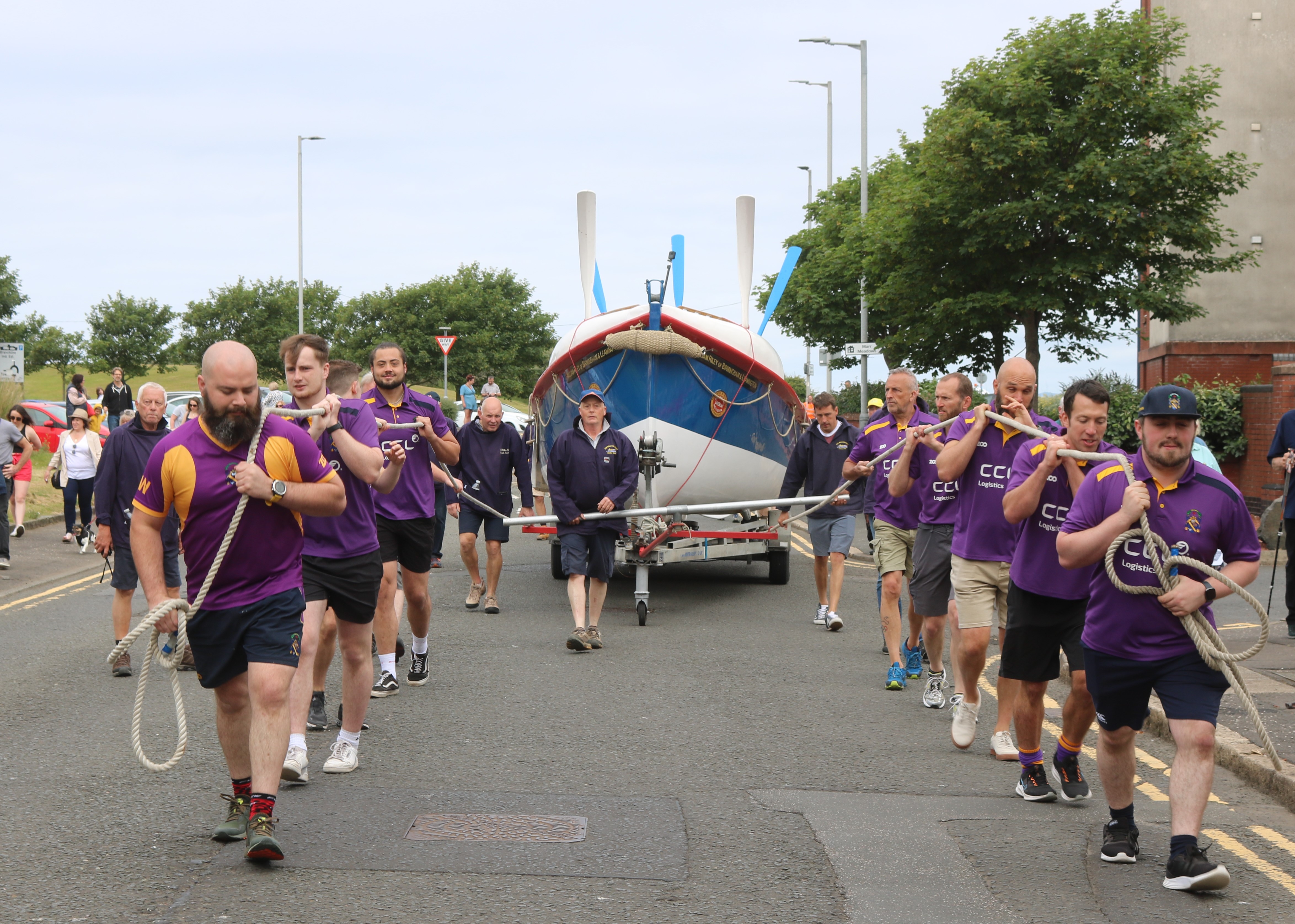 Marr Rugby Team pulling the restored William Riley Lifeboat