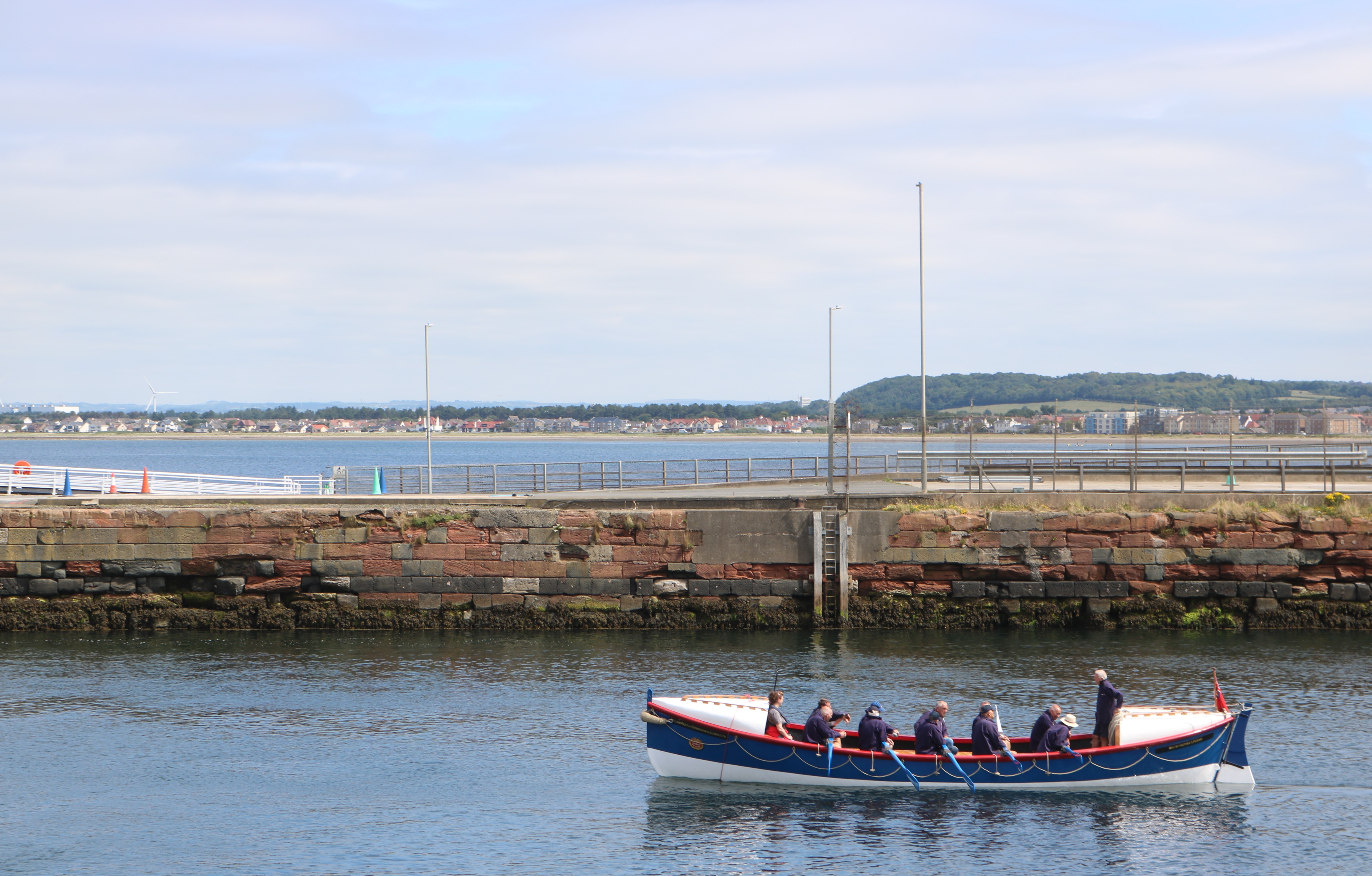 The restored William Riley lifeboat afloat in the harbour