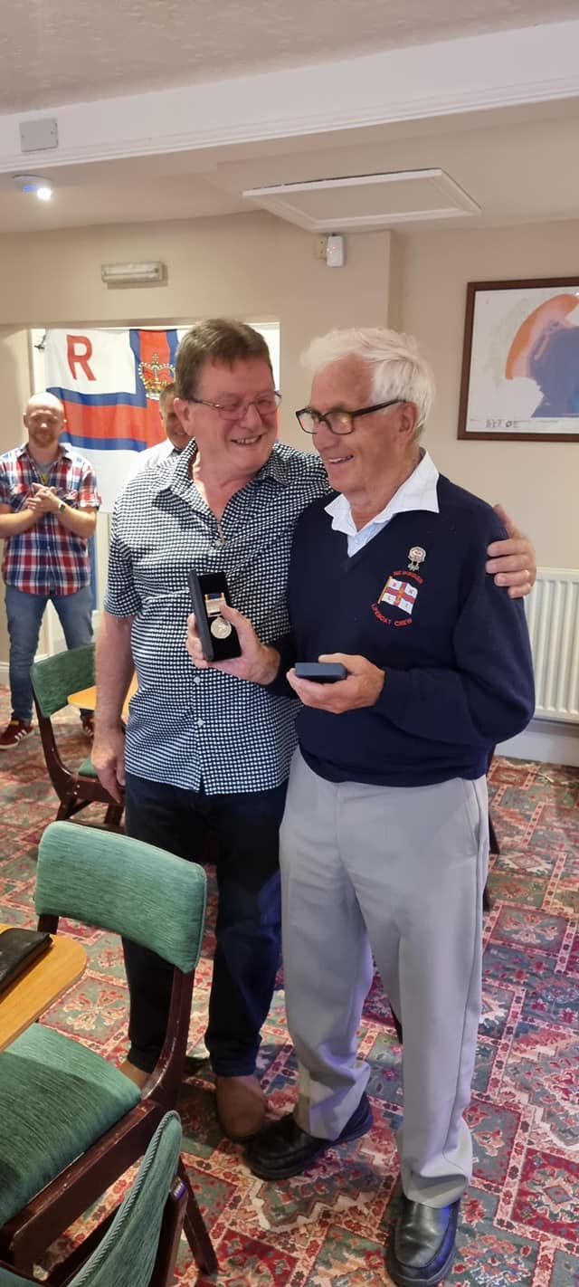 John Bryan, left, presenting two awards to Tim Martin