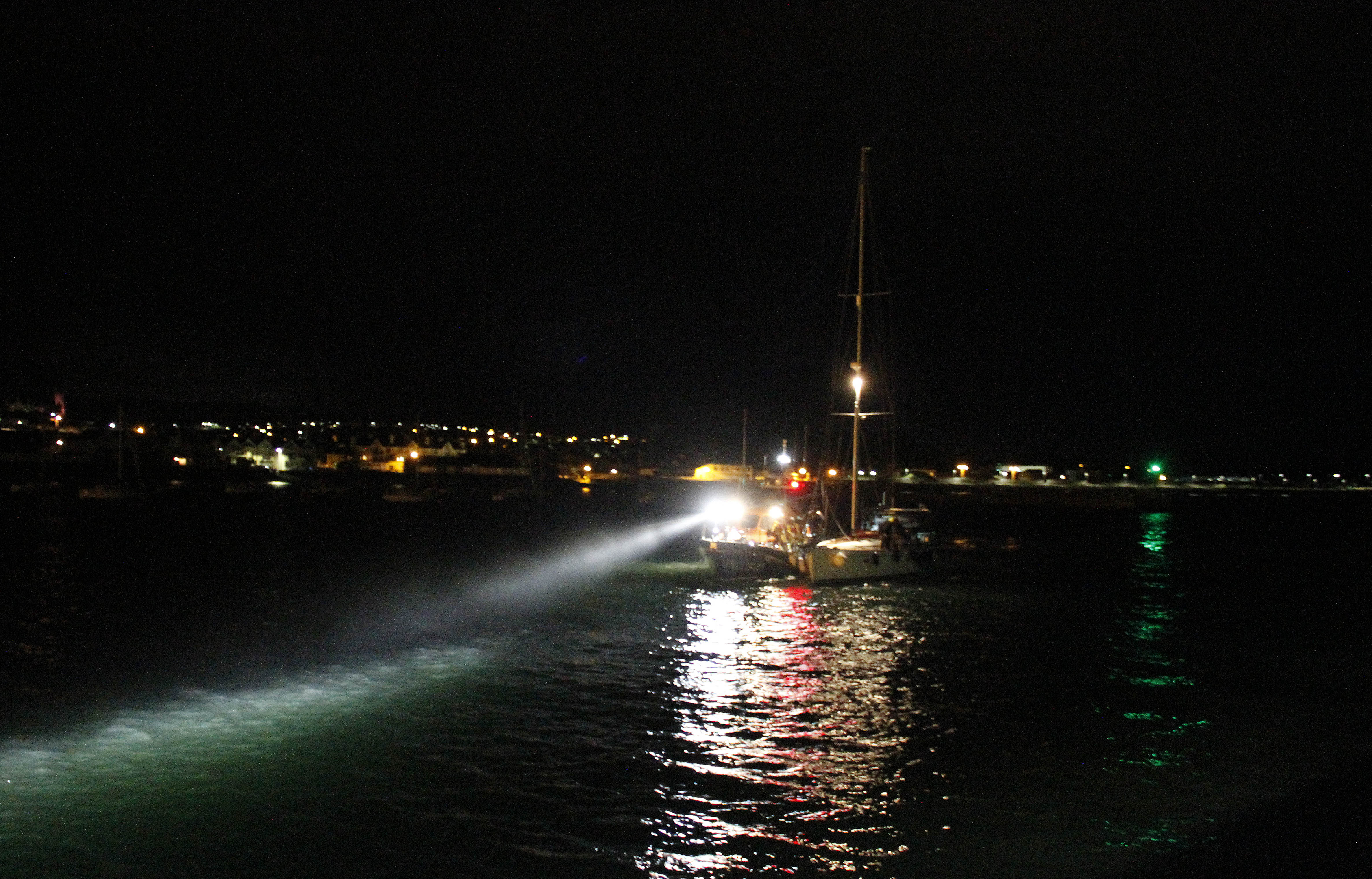 Wicklow all-weather lifeboat with the yacht in tow at Wicklow harbour