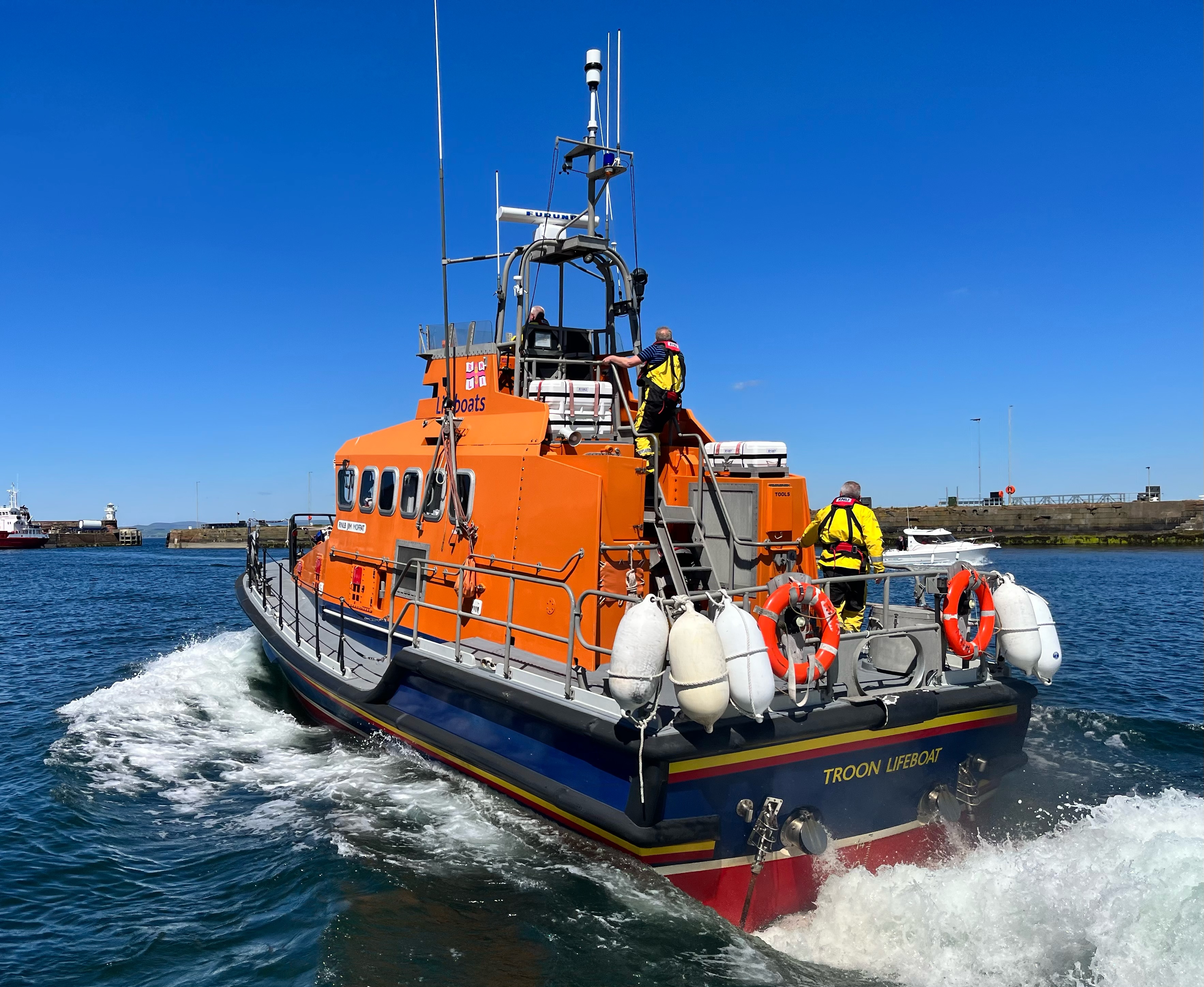 RNLI Trent class all-weather lifeboat RNLB Jim Moffat leaves the berth heading out on a shout