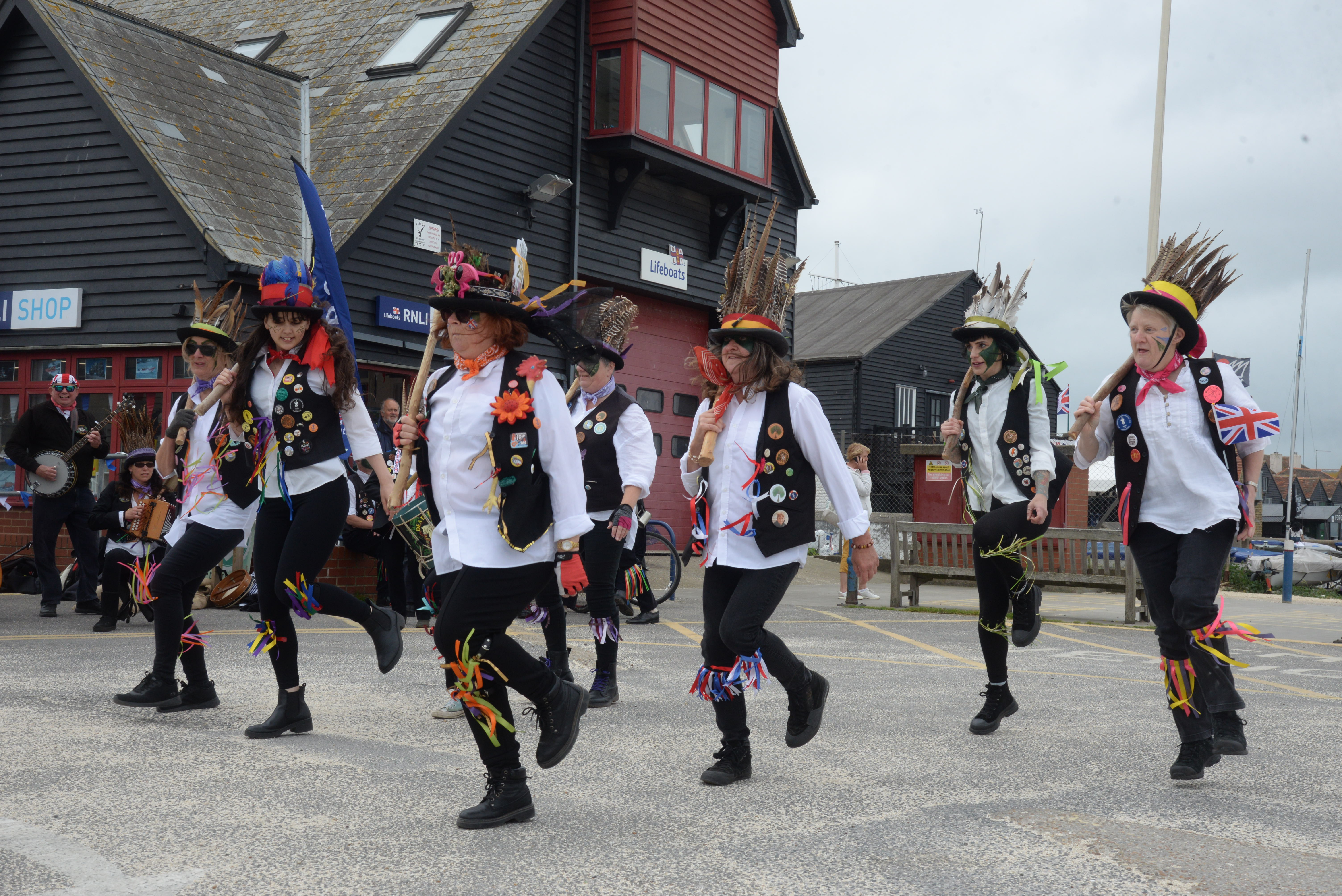 The Dead Horse Morris and Broomdashers performing outside Whitstable RNLI on the Saturday of the Jubilee weekend.