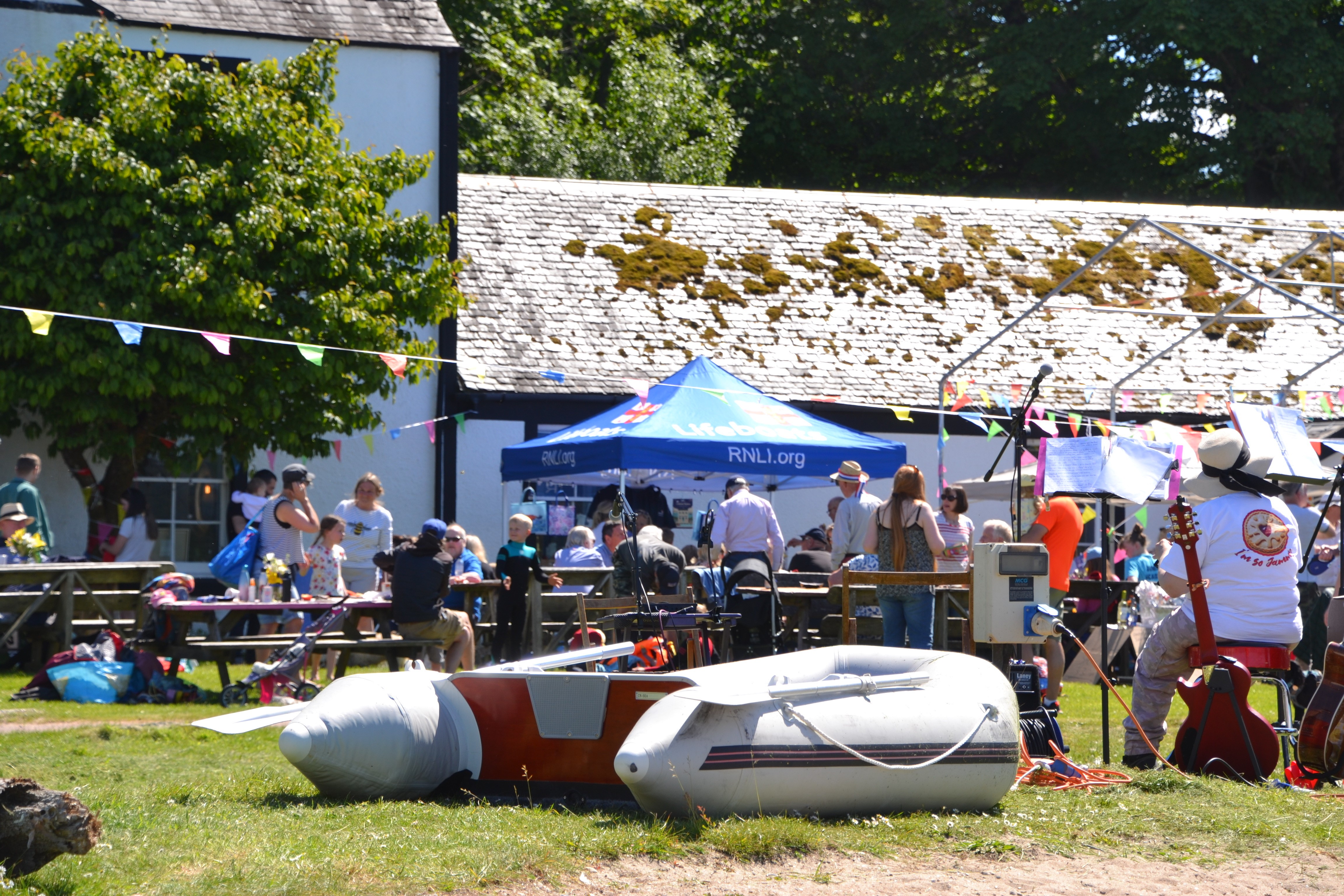 The band, bunting and supporters at the fundraising event
