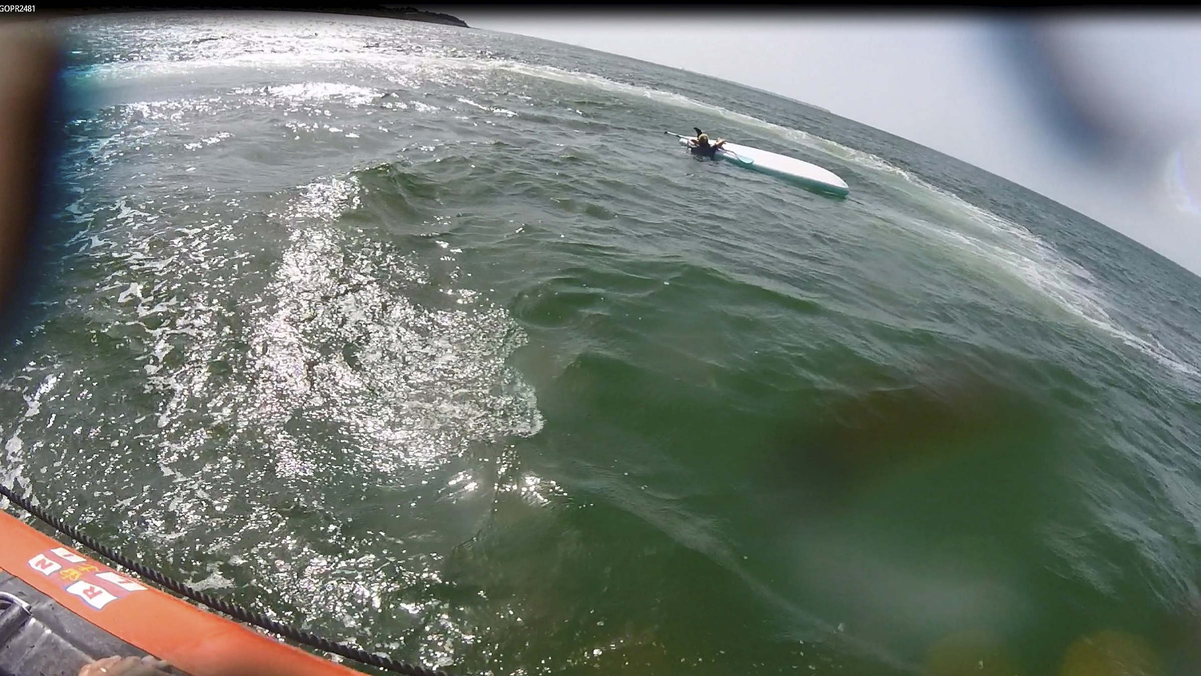 Whitstable lifeboat comes alongside the paddleboarder in need of assistance off Tankerton on Friday afternoon.