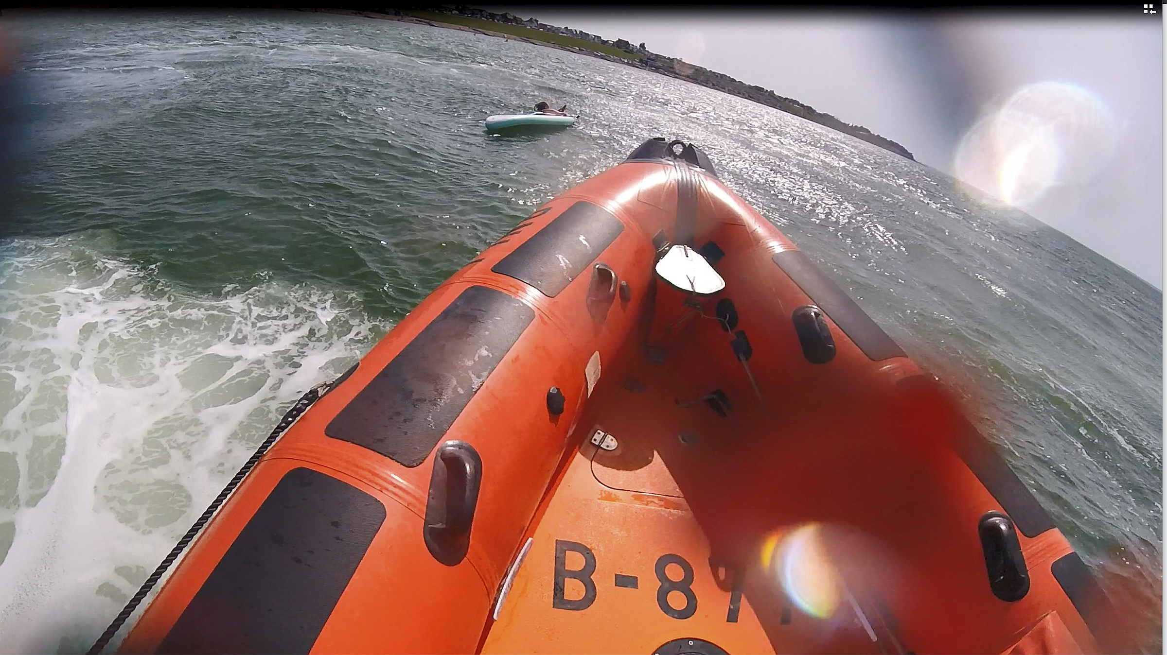 Whitstable lifeboat comes alongside the paddleboarder in need of assistance off Tankerton on Friday afternoon.