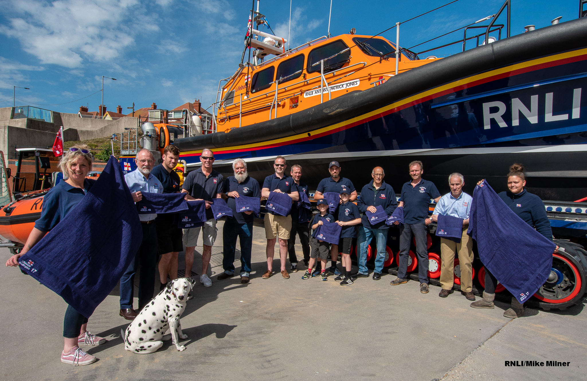 Frank and Jo Cook Present Towels to Crew of Bridlington RNLI