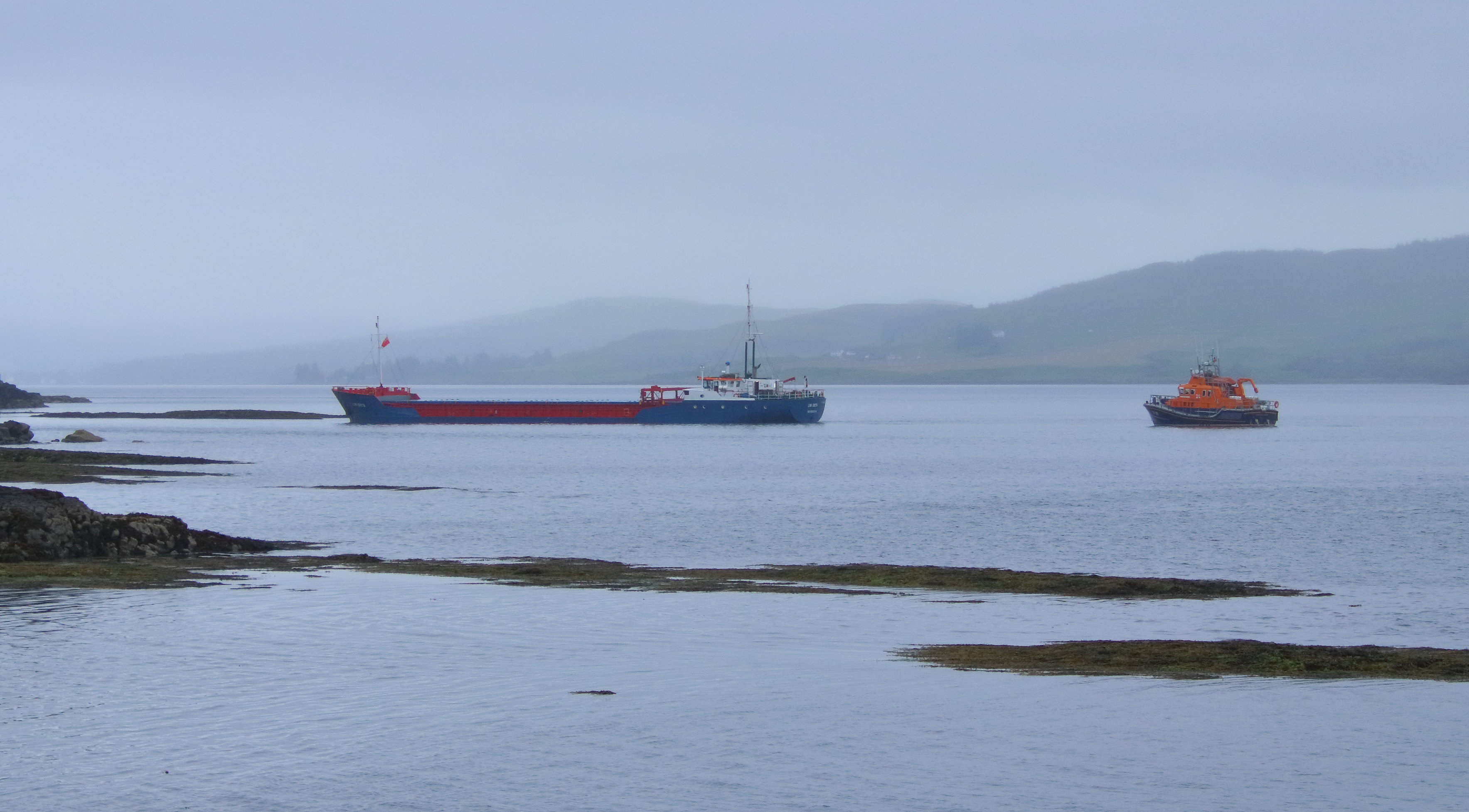 Tobermory RNLI lifeboat standing by grounded cargo ship