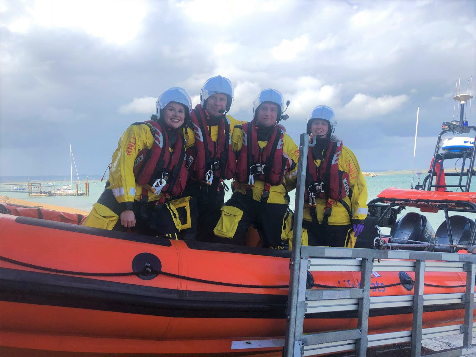 Kim Dugan, Neil Maxwell, Aaron Gent and Katie Baker in full kit on board the Atlantic 85 lifeboat