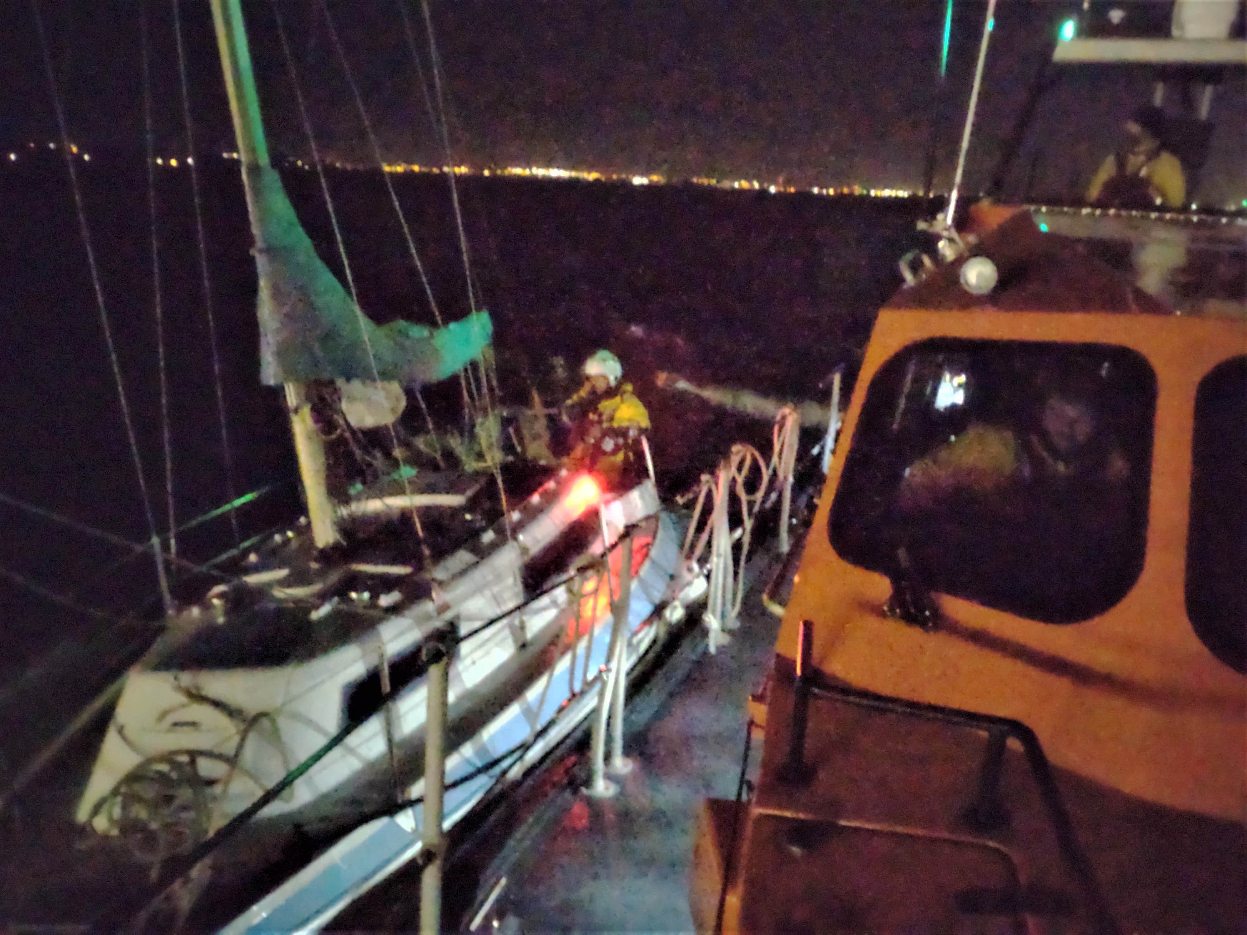 The casualty craft with its lone occupant safely alongside the Sheerness lifeboat.