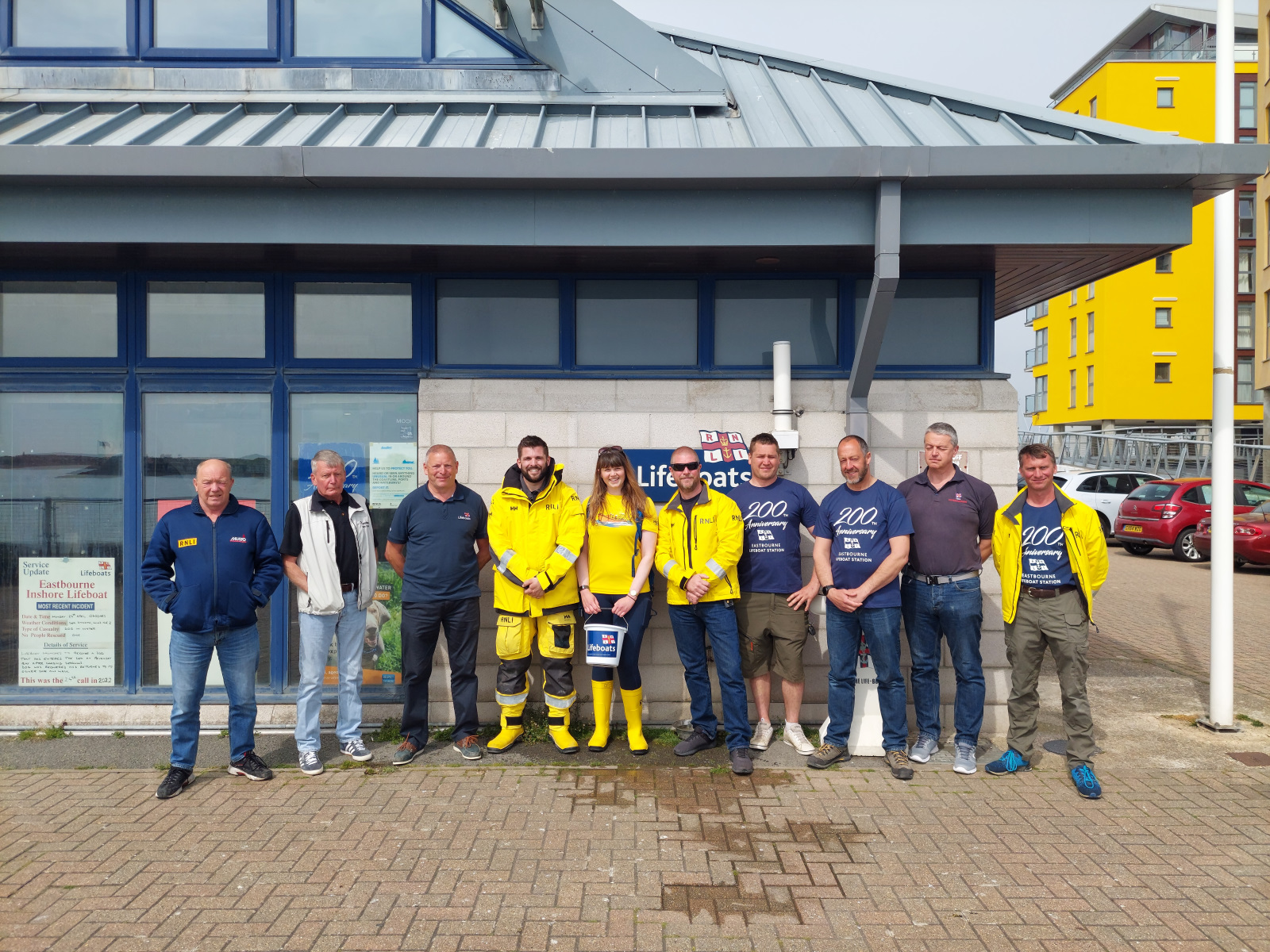 David and Sara stood with members of Eastbourne lifeboat crew